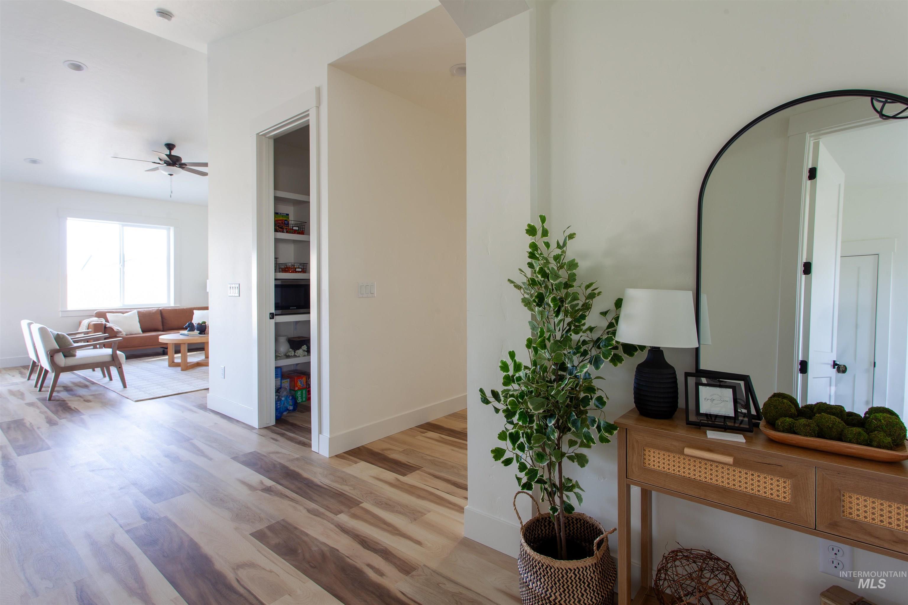 Office space featuring light wood finished floors and baseboards