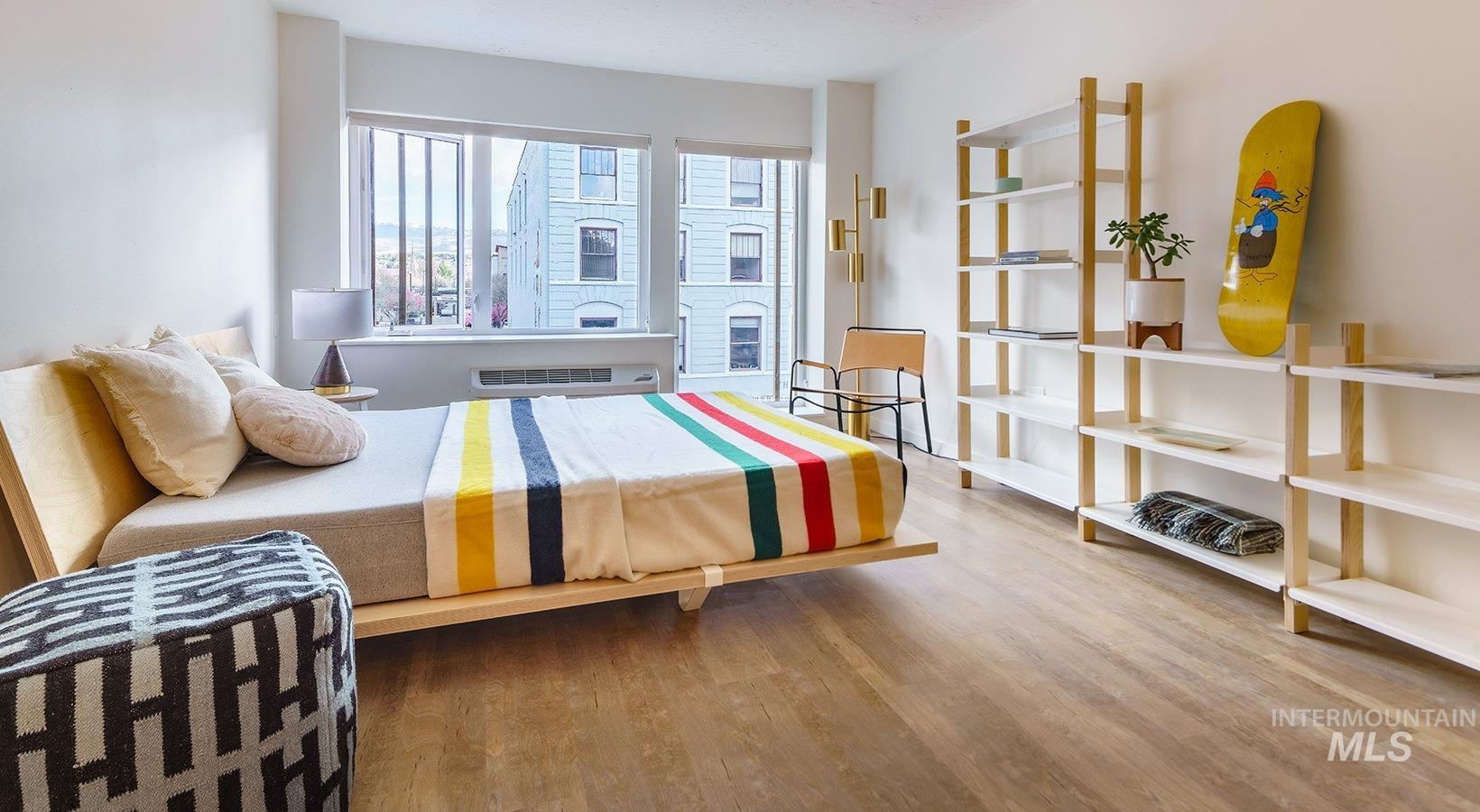 Bedroom with light wood-type flooring
