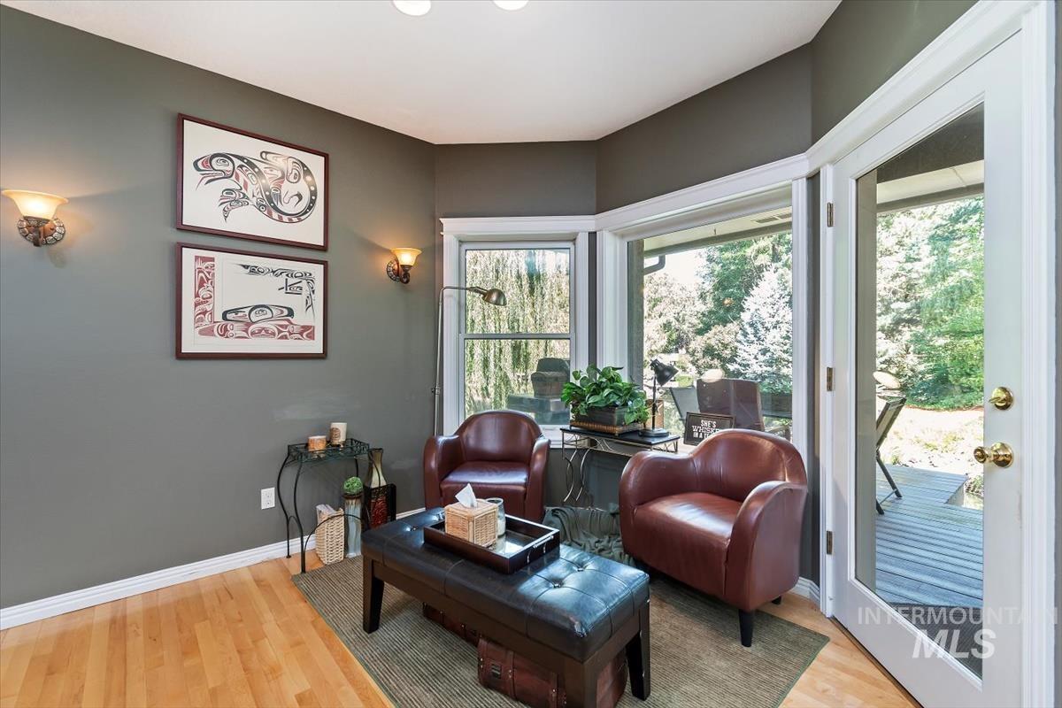 Living area with light wood-style floors