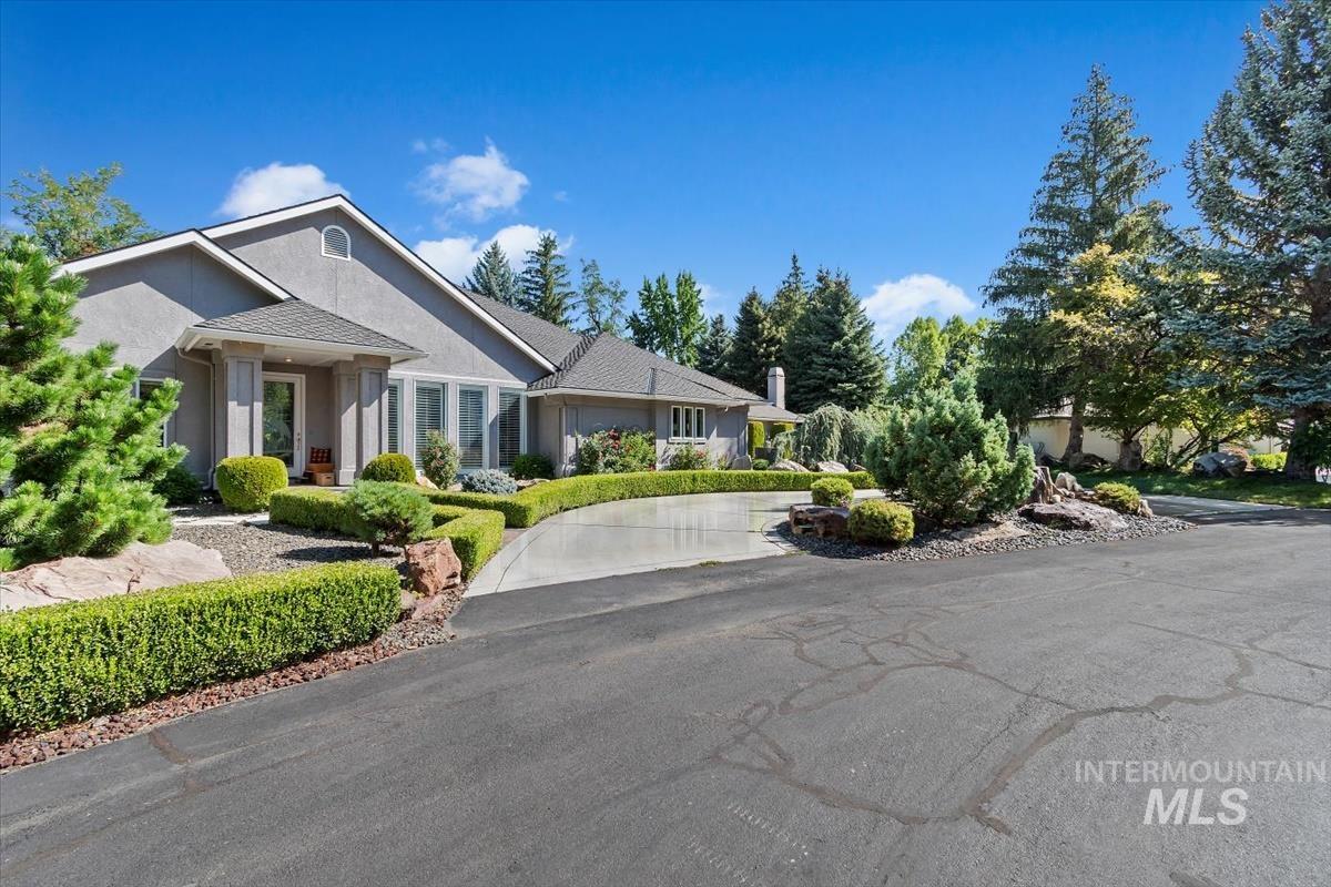 Single story home with stucco siding