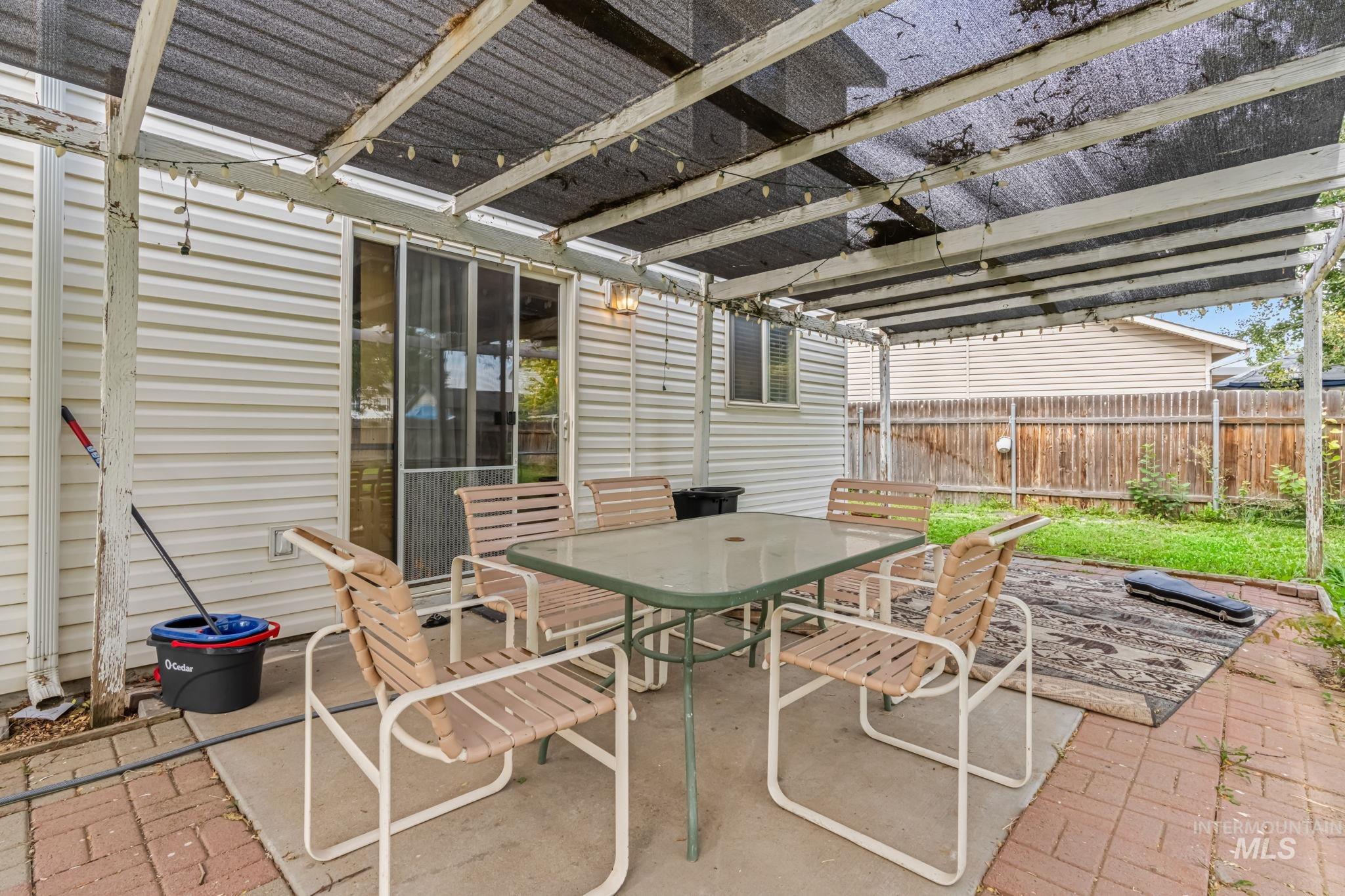 View of patio / terrace with outdoor dining space and a pergola