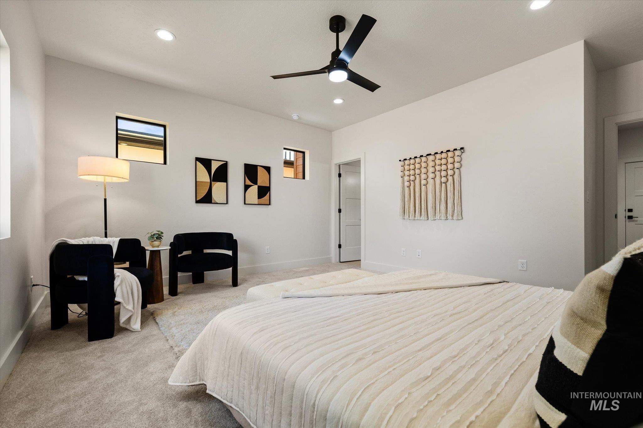 Bedroom with carpet, recessed lighting, and a ceiling fan