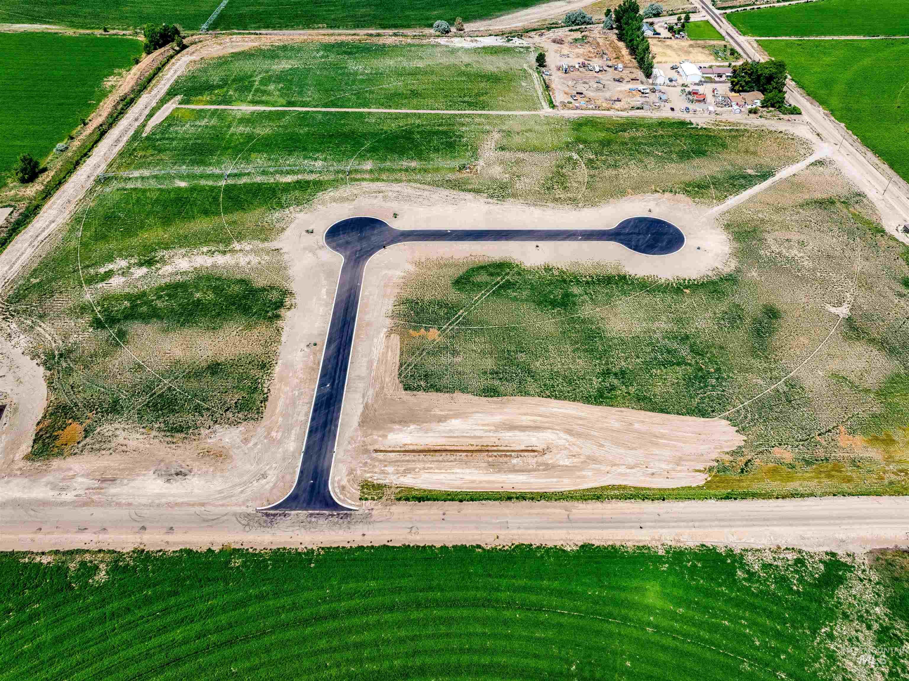 Aerial view of property and surrounding area with rural landscape