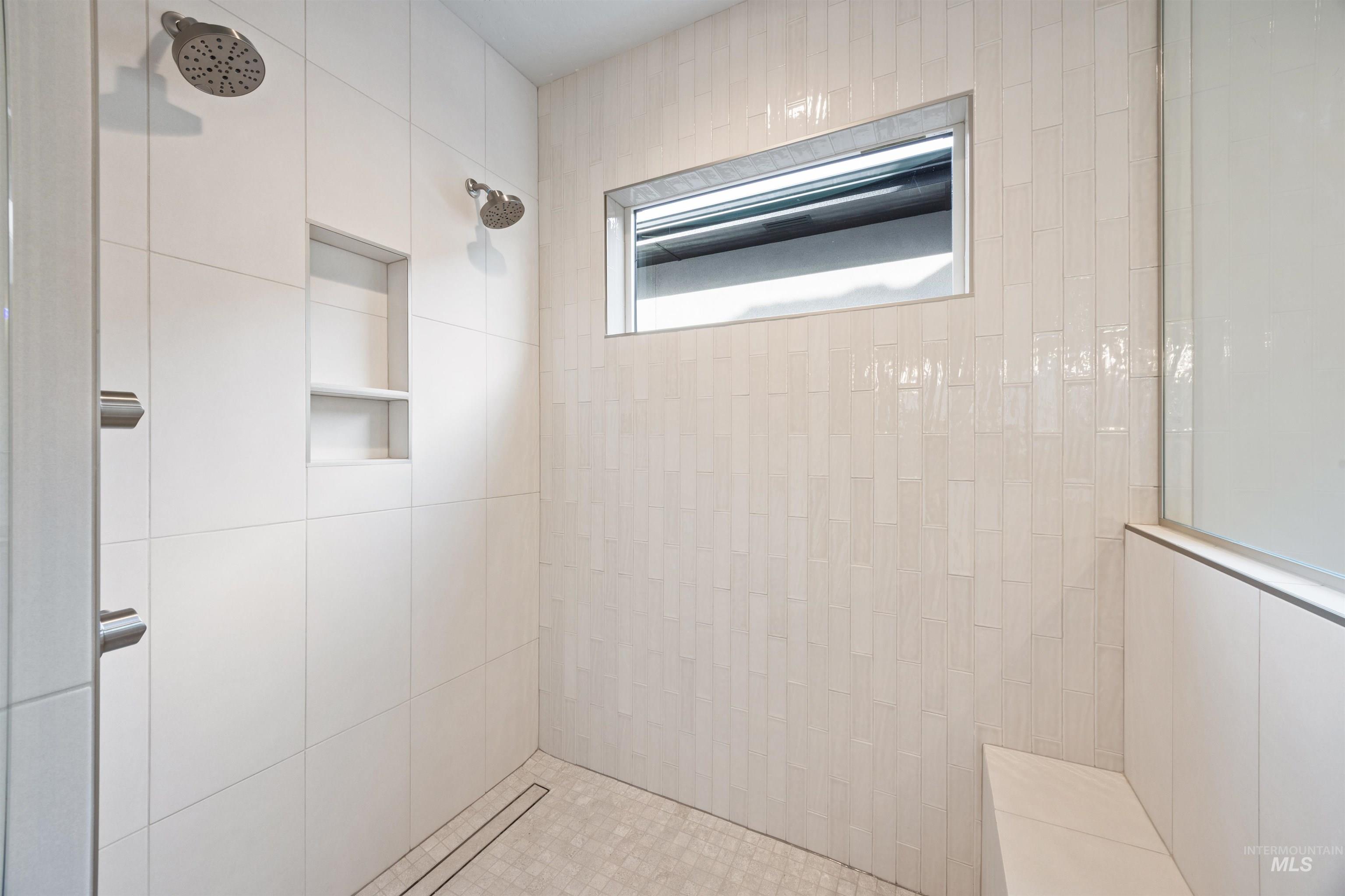 Full bath with tiled shower