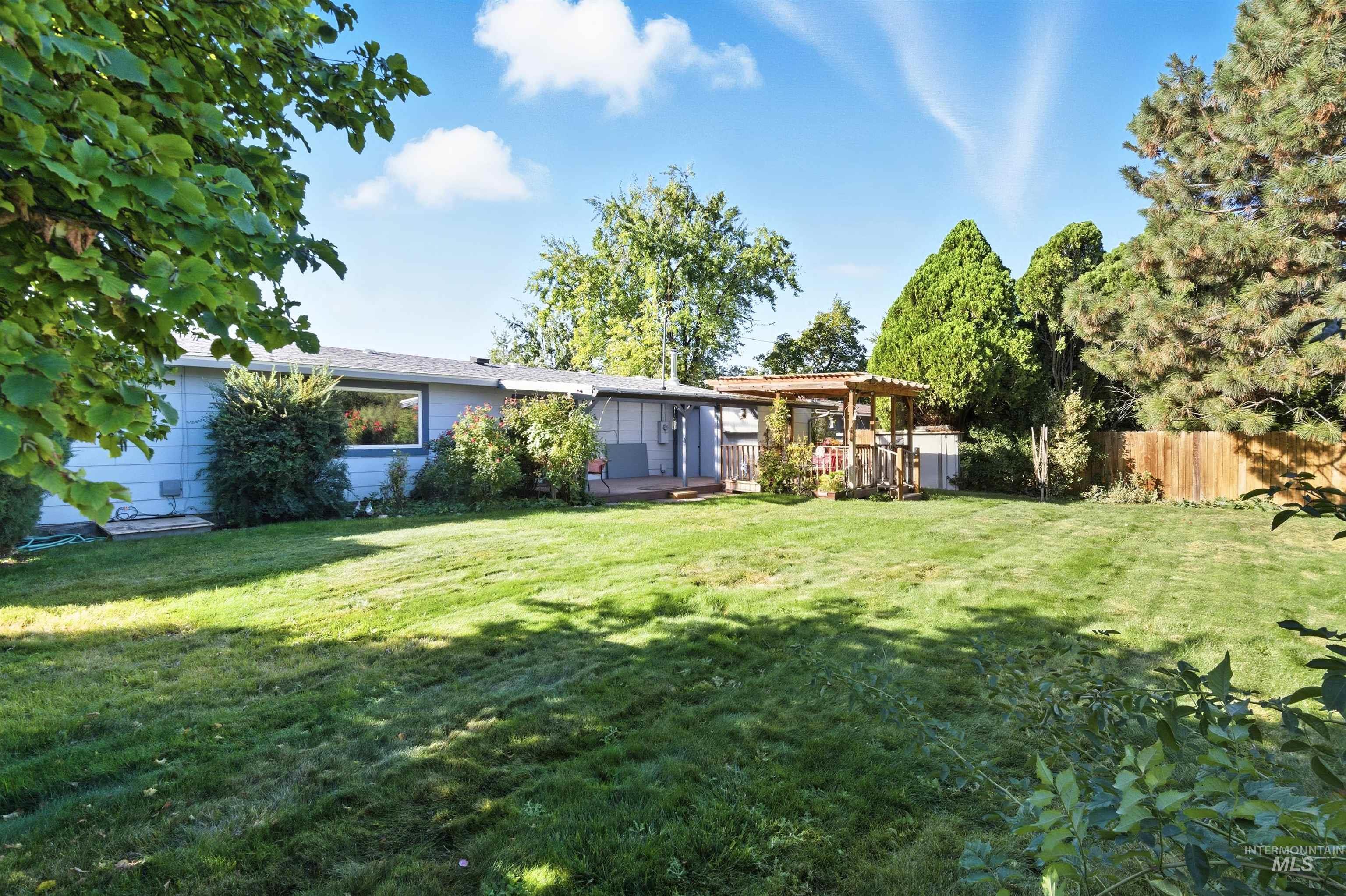 View of yard with a pergola