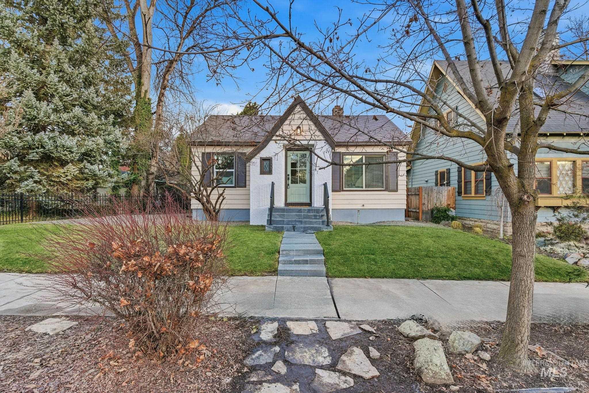 View of front of house with a chimney