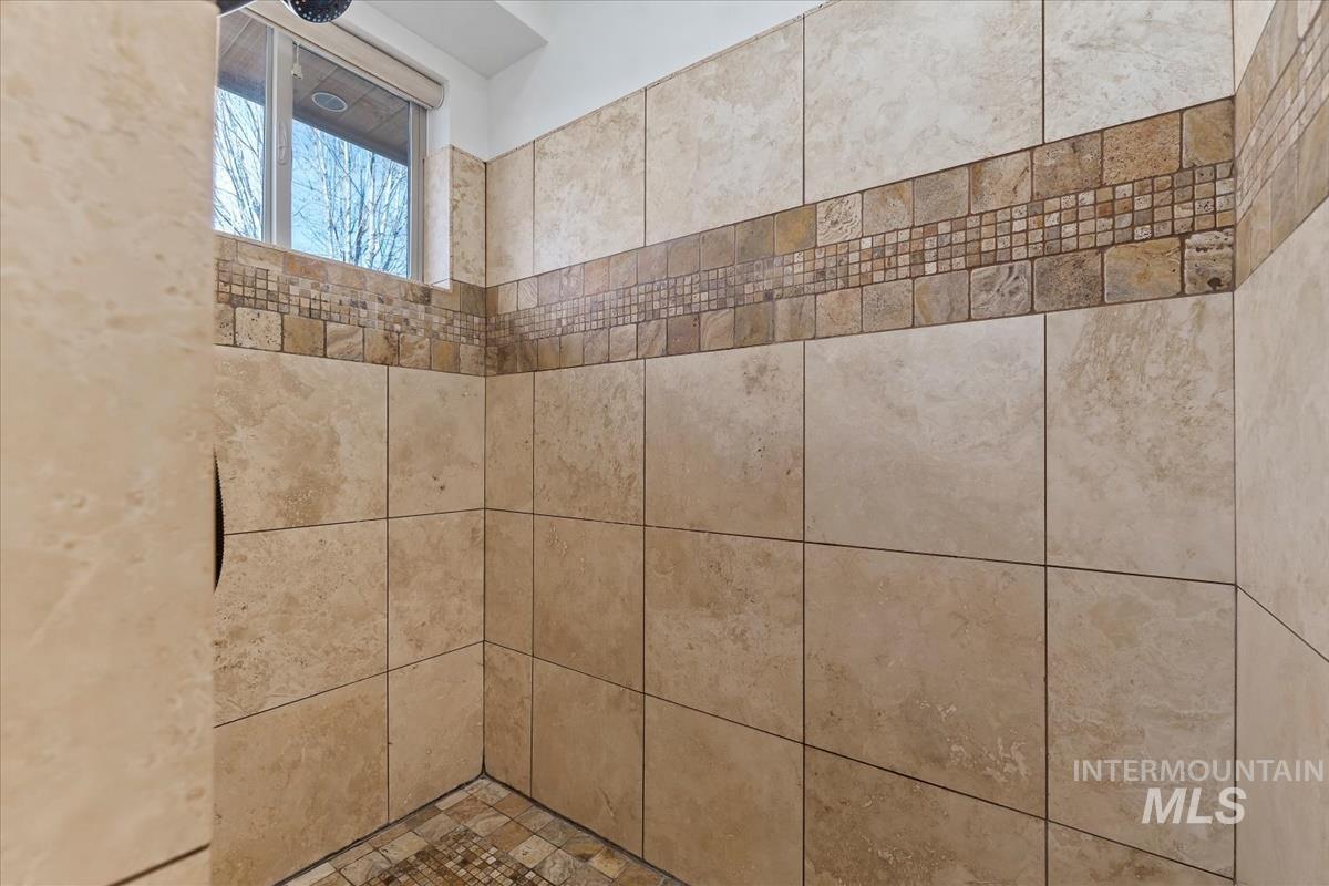 Bathroom view of tiled shower