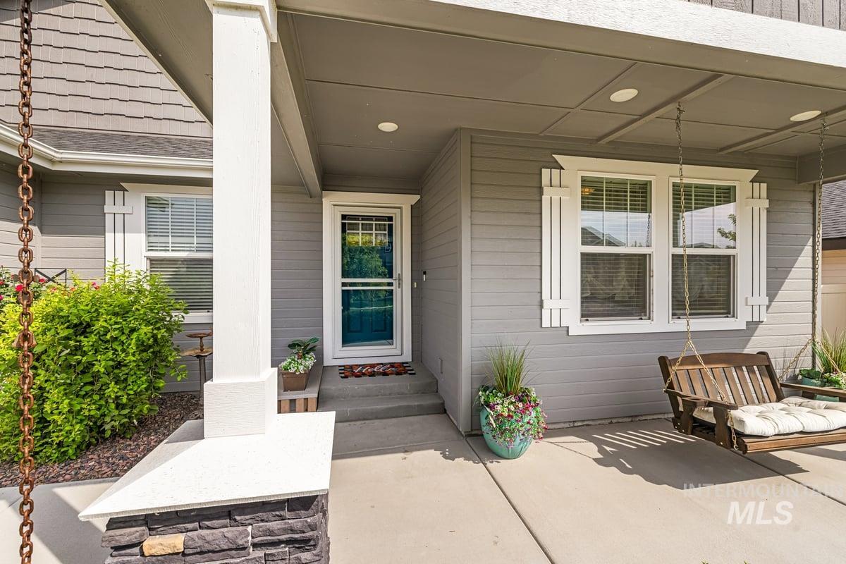 Property entrance featuring covered porch