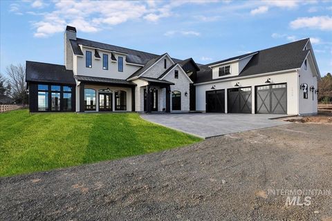 Photo of 5909 E Greenhill Street, Nampa, ID 83687 (MLS # 98983300)