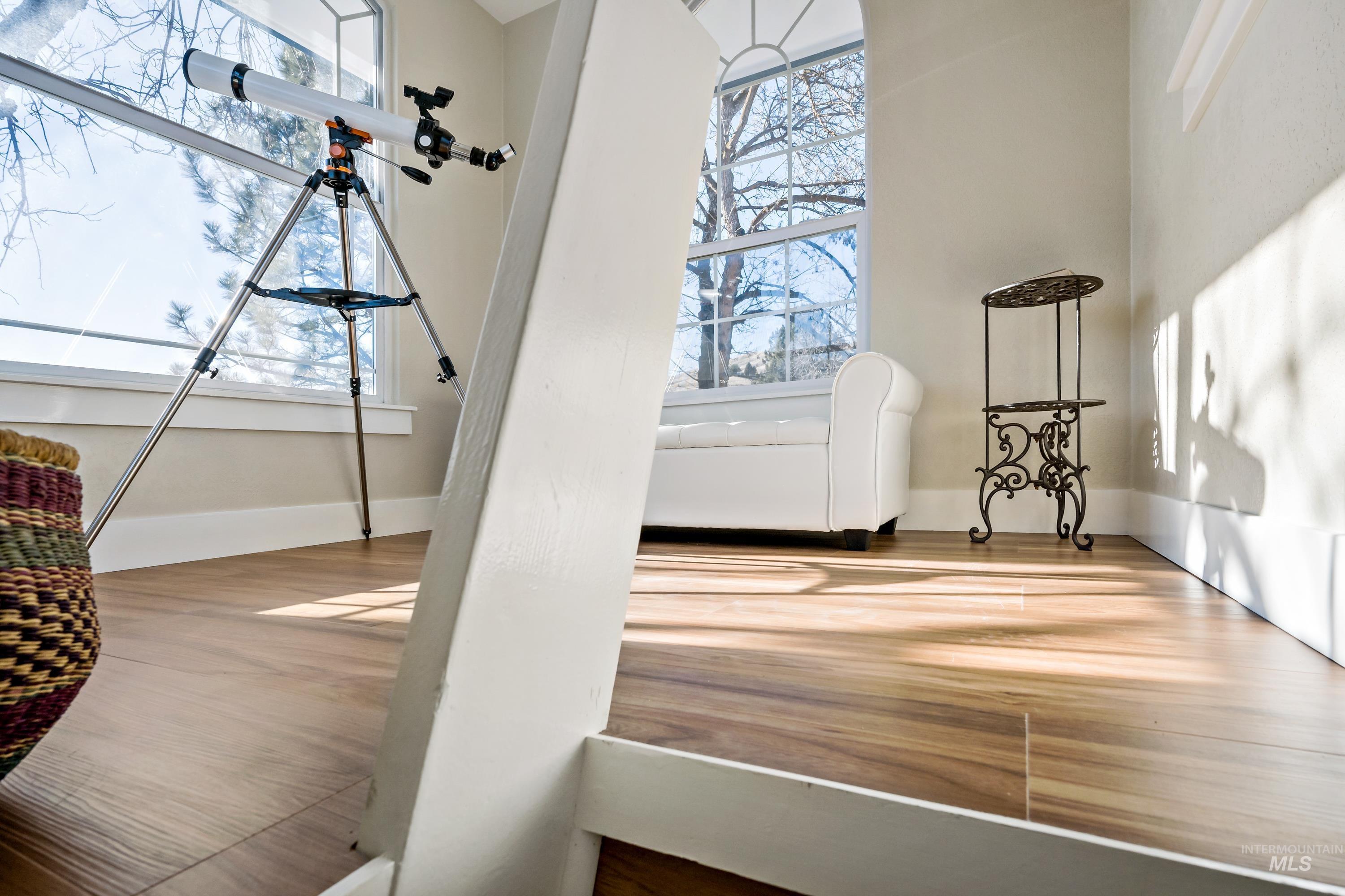 Detailed view of wood finished floors and baseboards