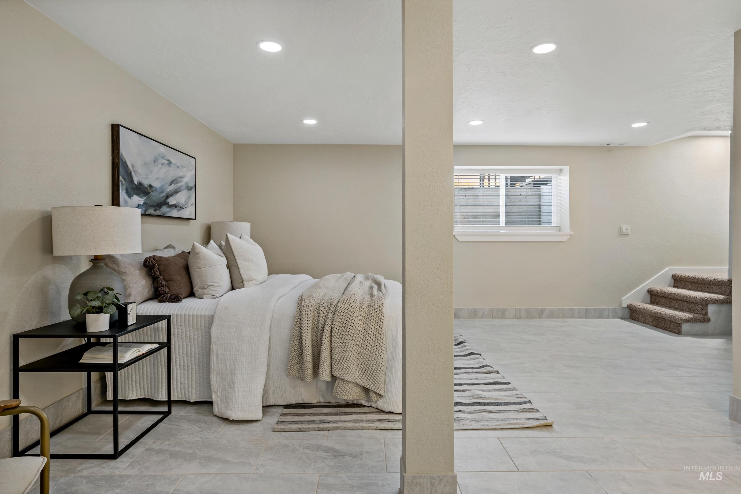 Bedroom featuring recessed lighting and light tile patterned floors