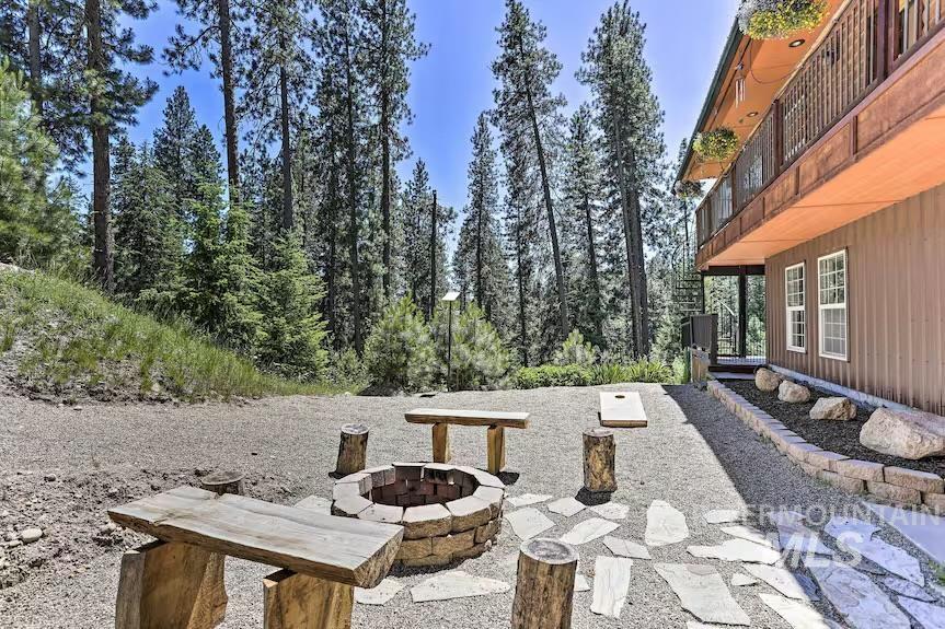 View of patio / terrace featuring a fire pit