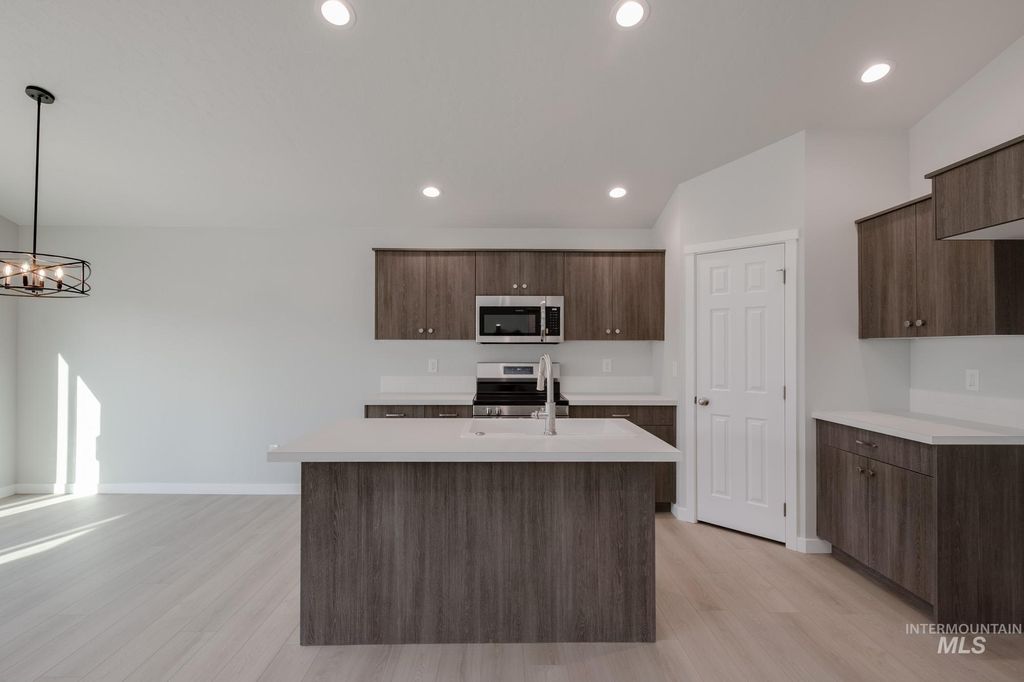 Photo of 345 N Cranesbill Ave, Kuna, ID 83634 (MLS # 98967513)