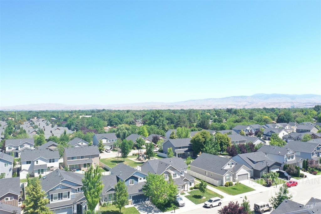 Aerial perspective of suburban area featuring mountains