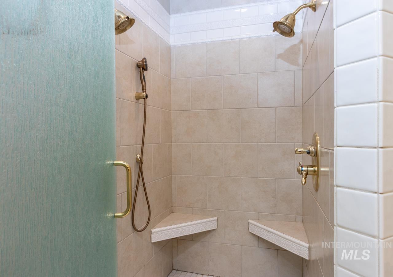 Full bathroom featuring tiled shower