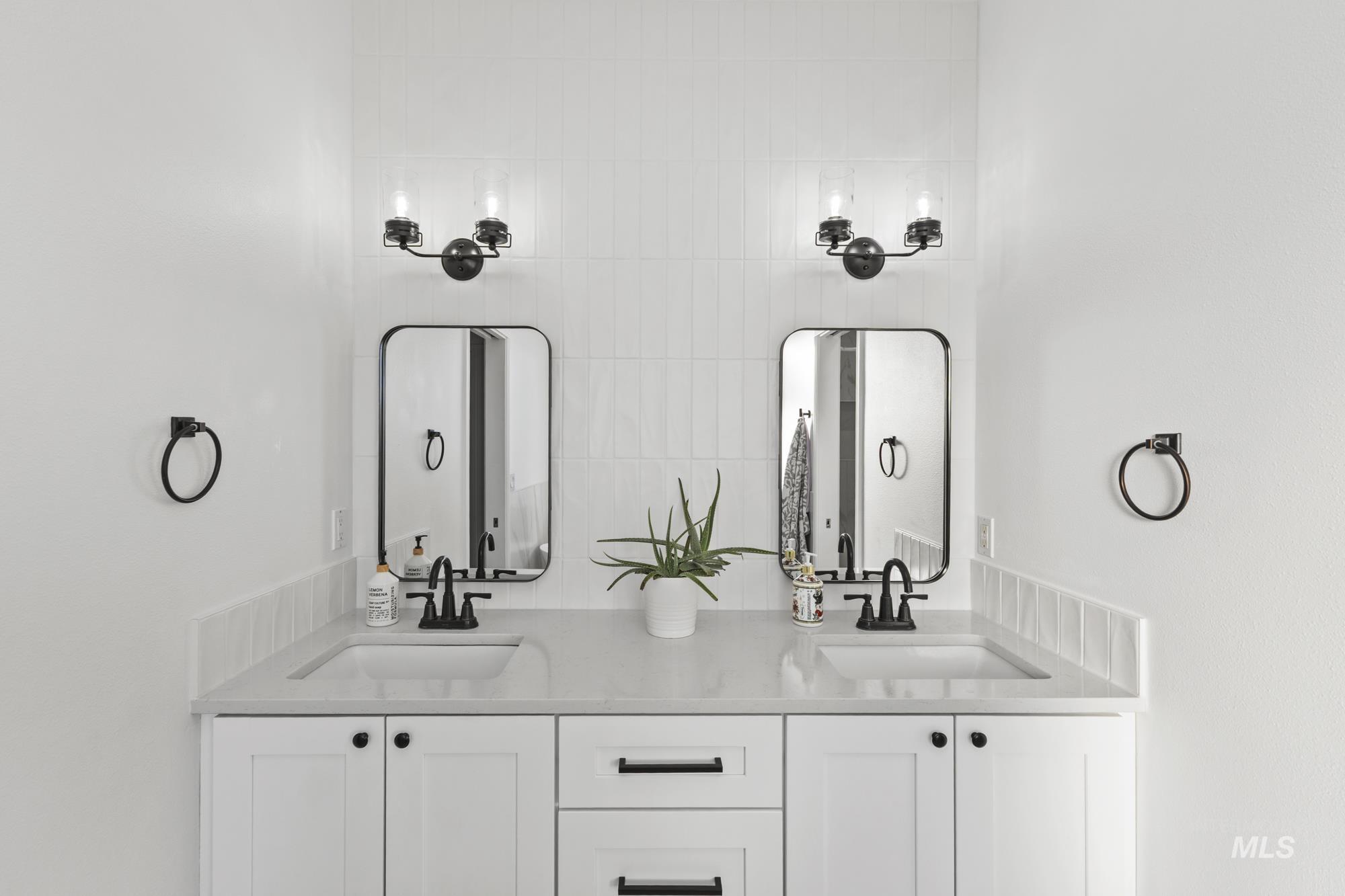 Bathroom featuring double vanity