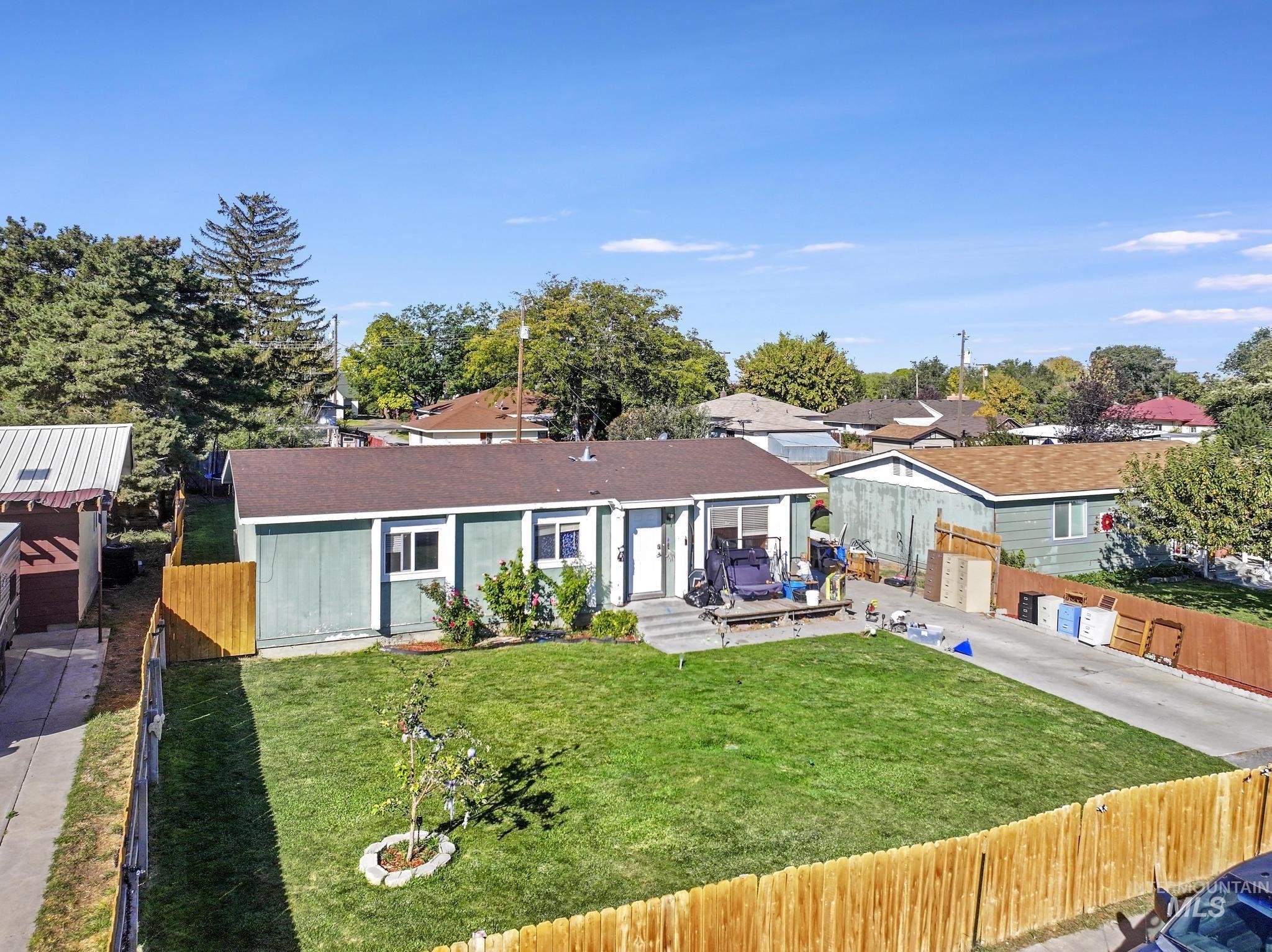 Ranch-style house featuring a patio