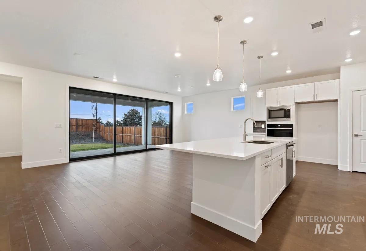 11772 W Anthos Ln