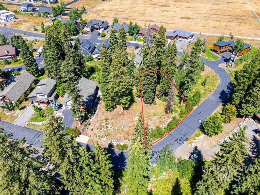 Aerial overview of property's location featuring property parcel outlined