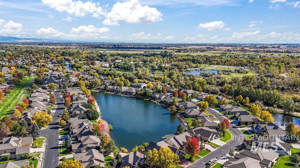 Aerial view of residential area with a nearby body of water