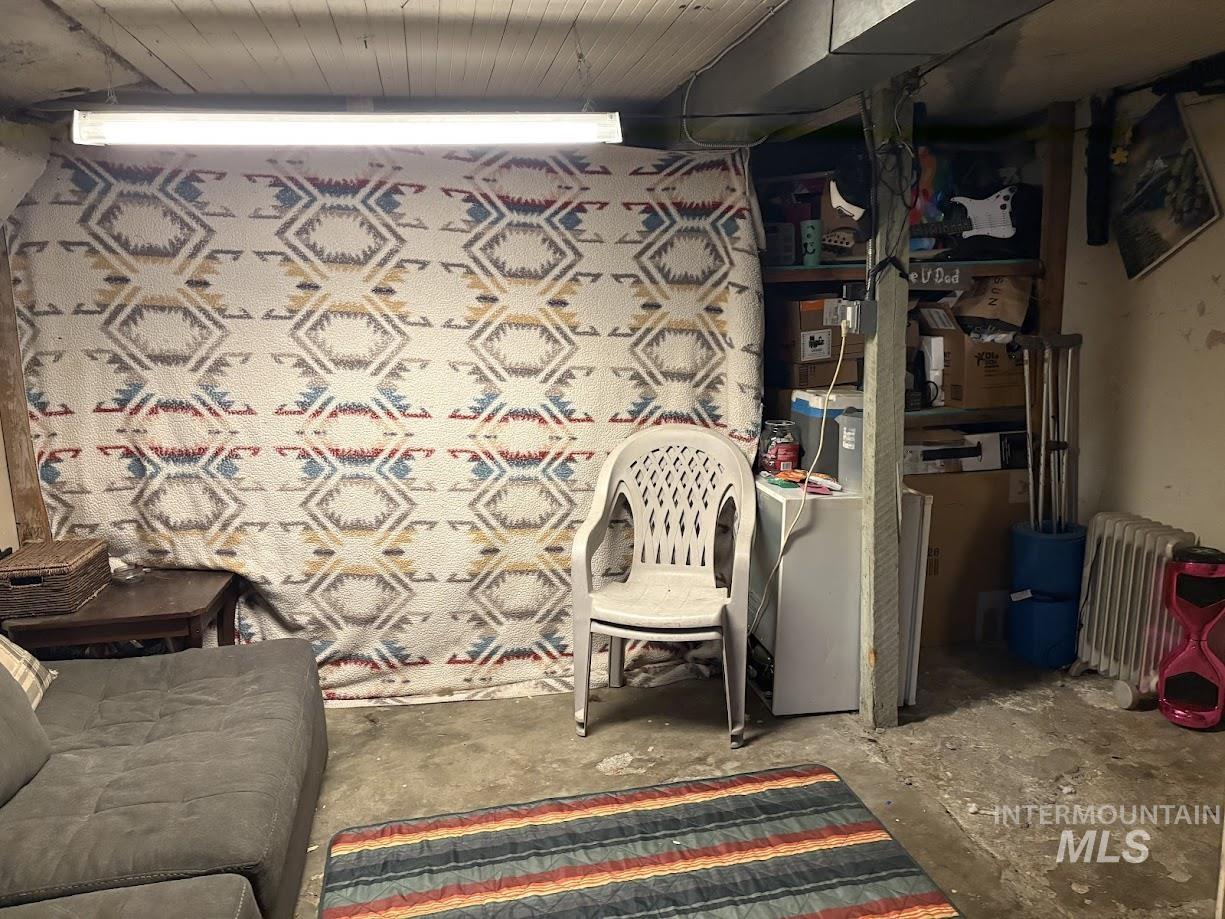 Basement with radiator heating unit