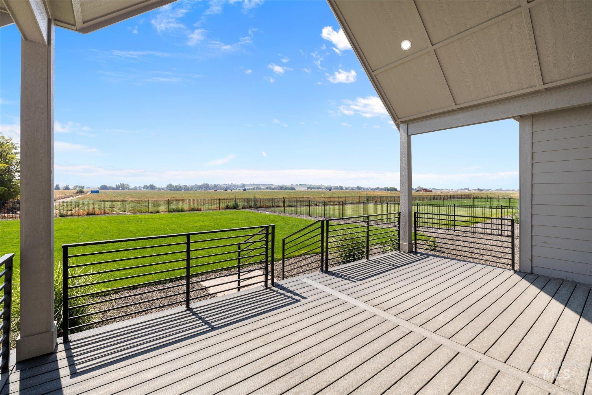 Deck featuring a rural view