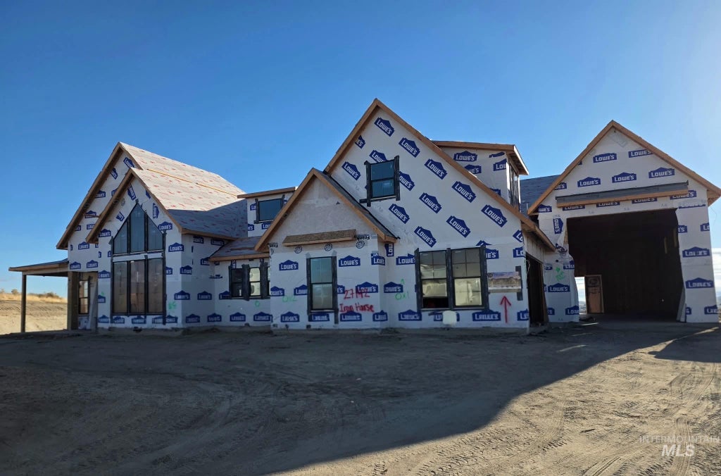 Photo of 27142 Iron Horse Dr, Caldwell, ID 83607 (MLS # 99004917)