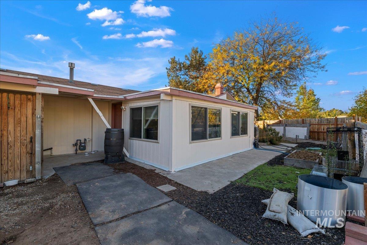 View of home's exterior with a patio
