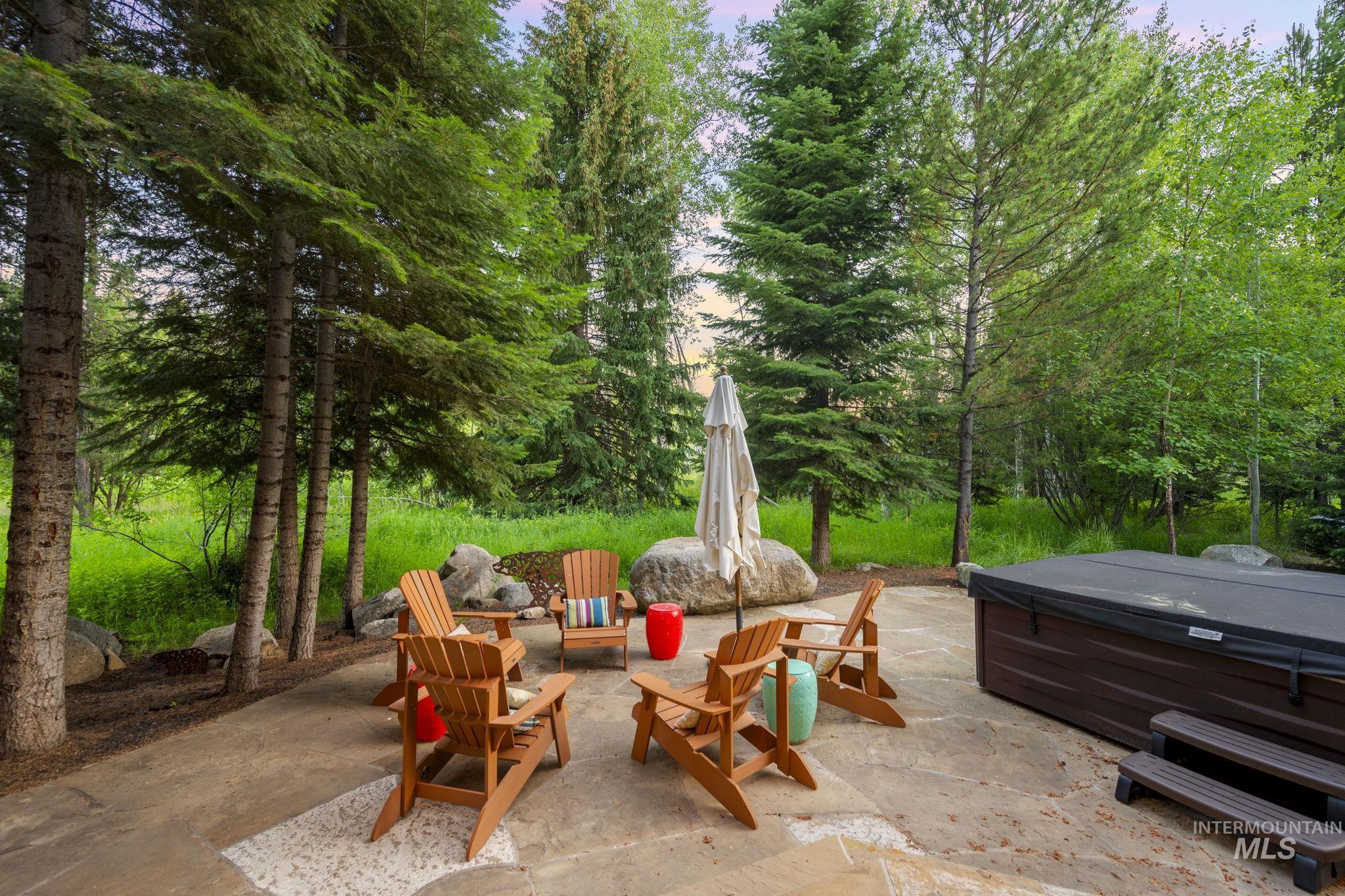 View of patio / terrace featuring a hot tub