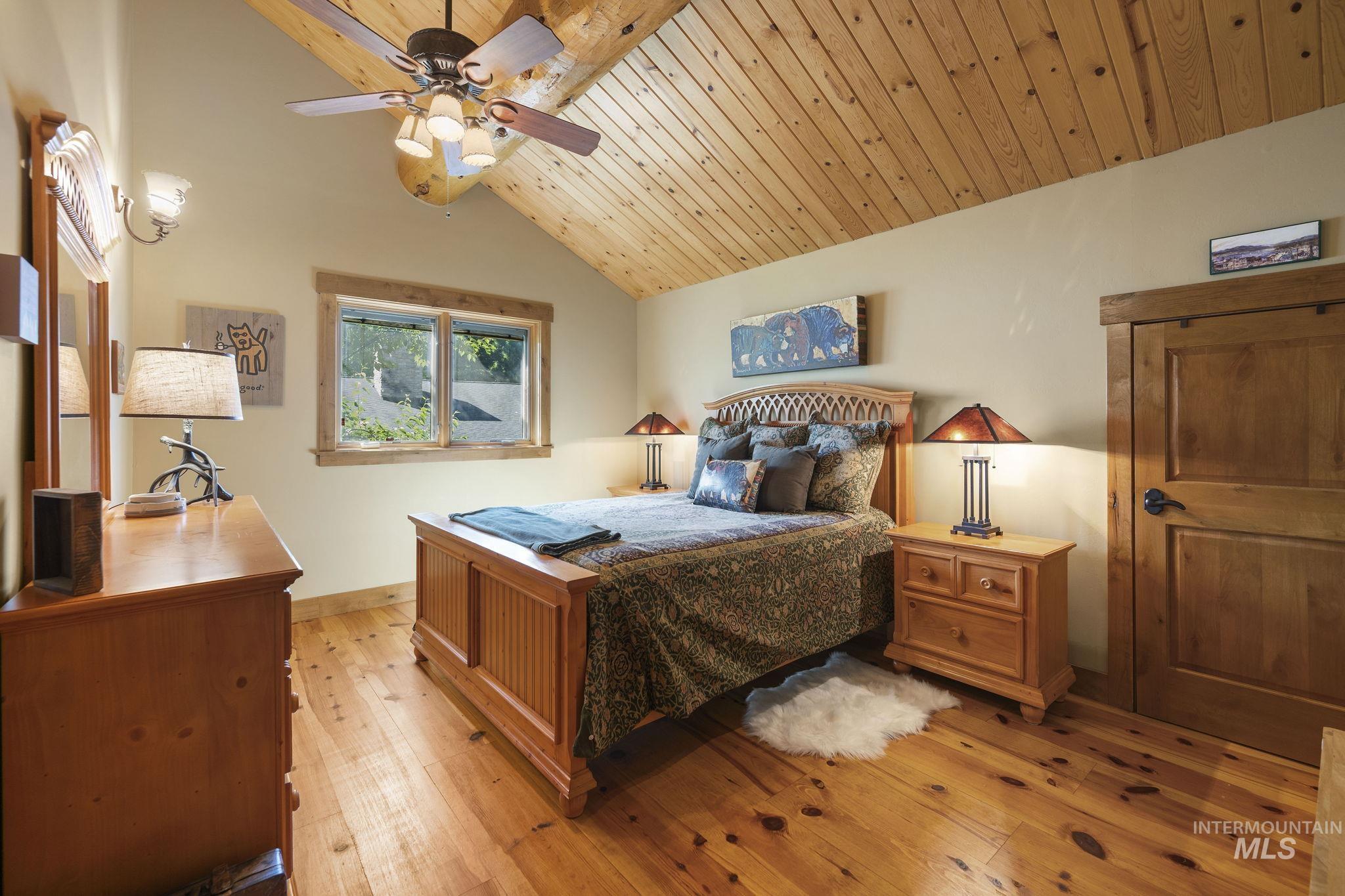 Bedroom featuring light wood finished floors and ceiling fan