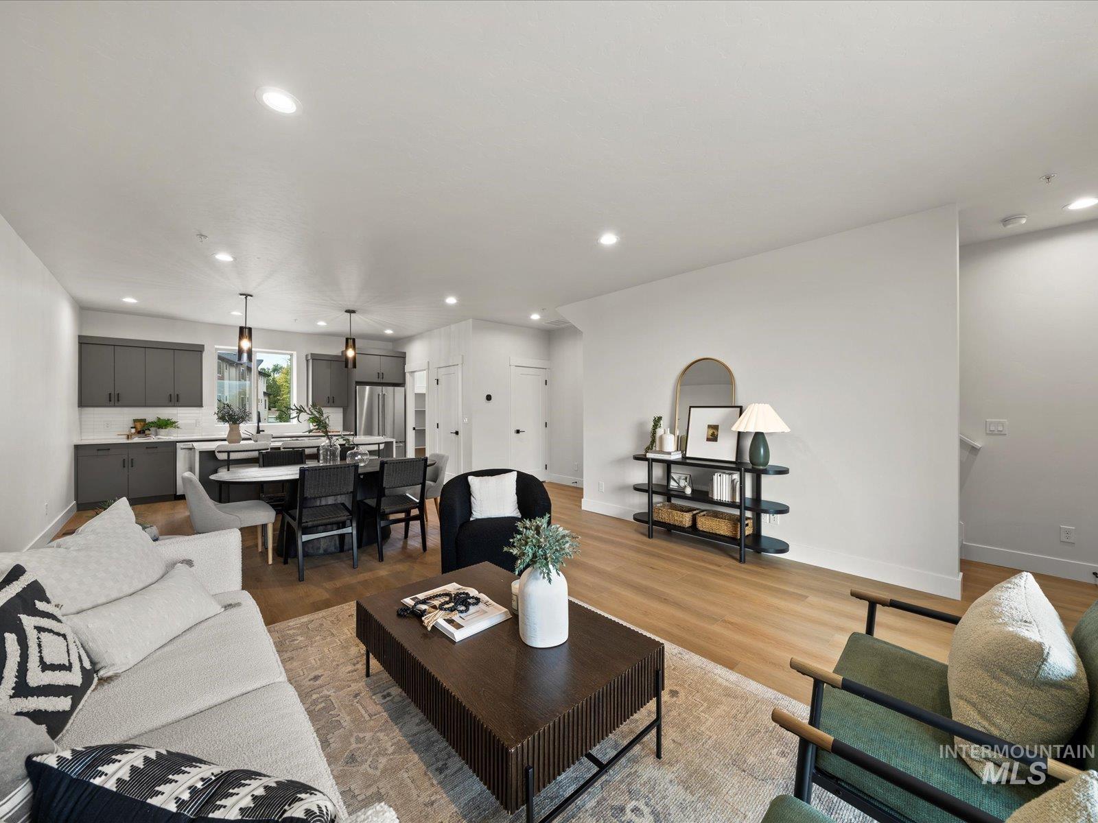 Living area with recessed lighting and wood finished floors