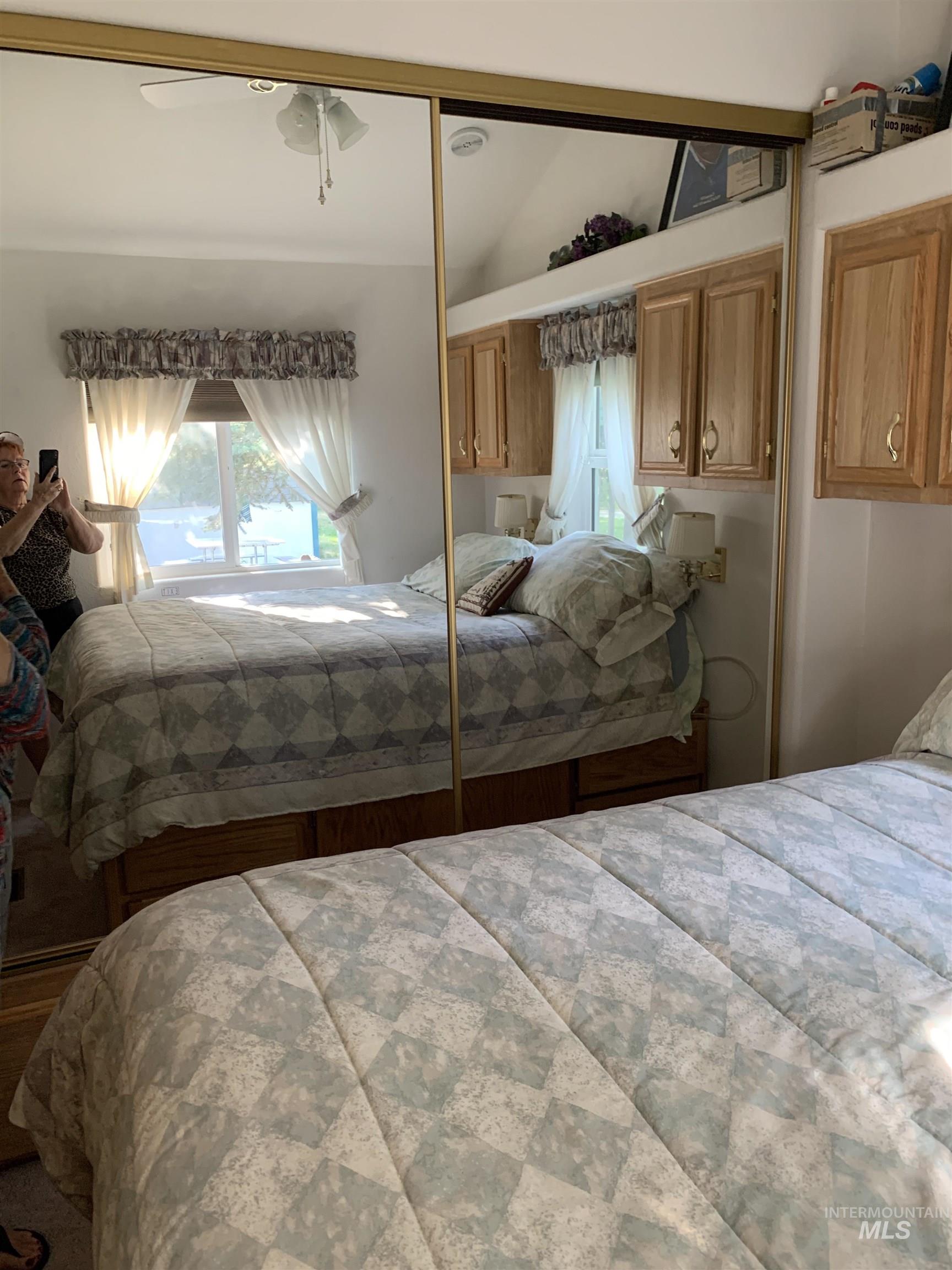 Bedroom featuring a closet and ceiling fan