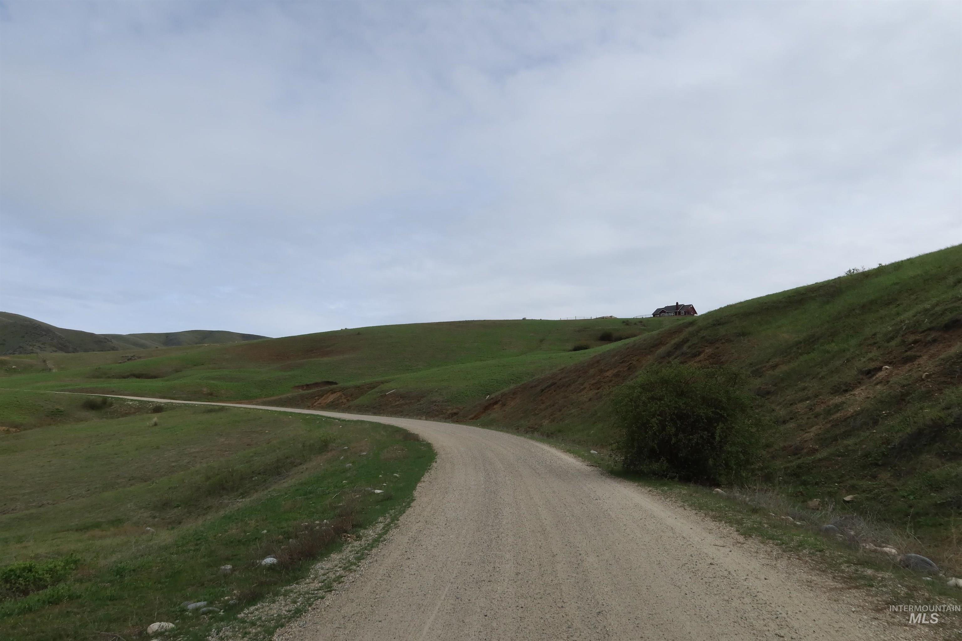 Located just off Ramsey Rd, a well-kept road that makes coming and going easy in any season