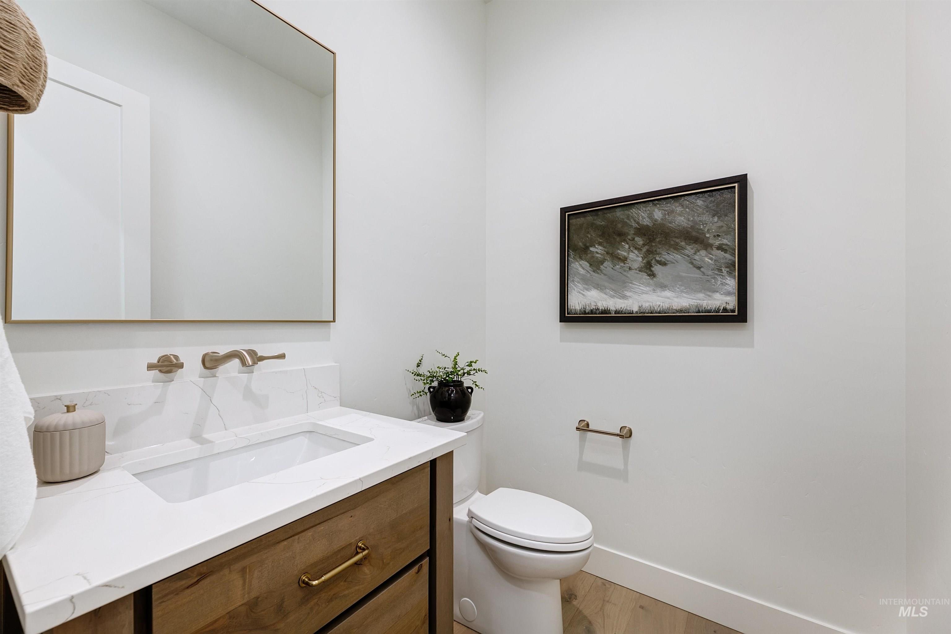 Bathroom with vanity and light wood-style flooring