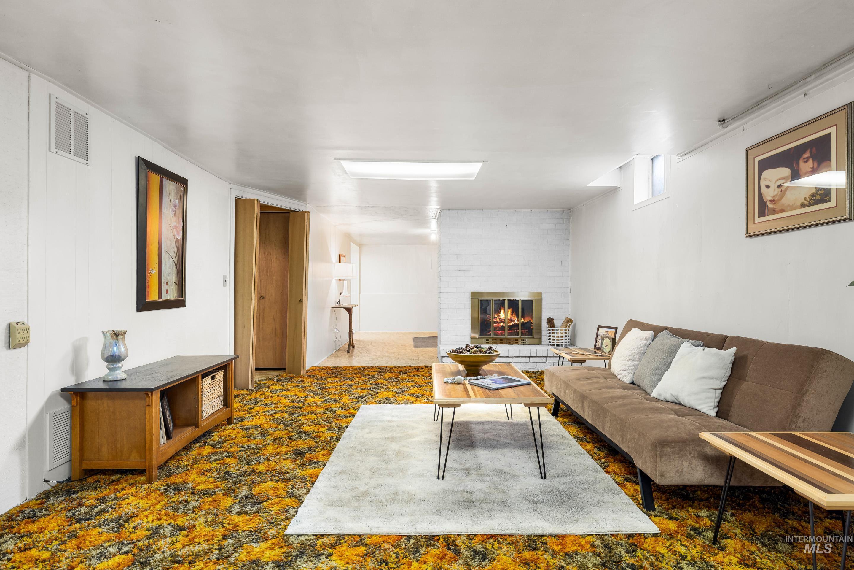 Living area featuring a fireplace