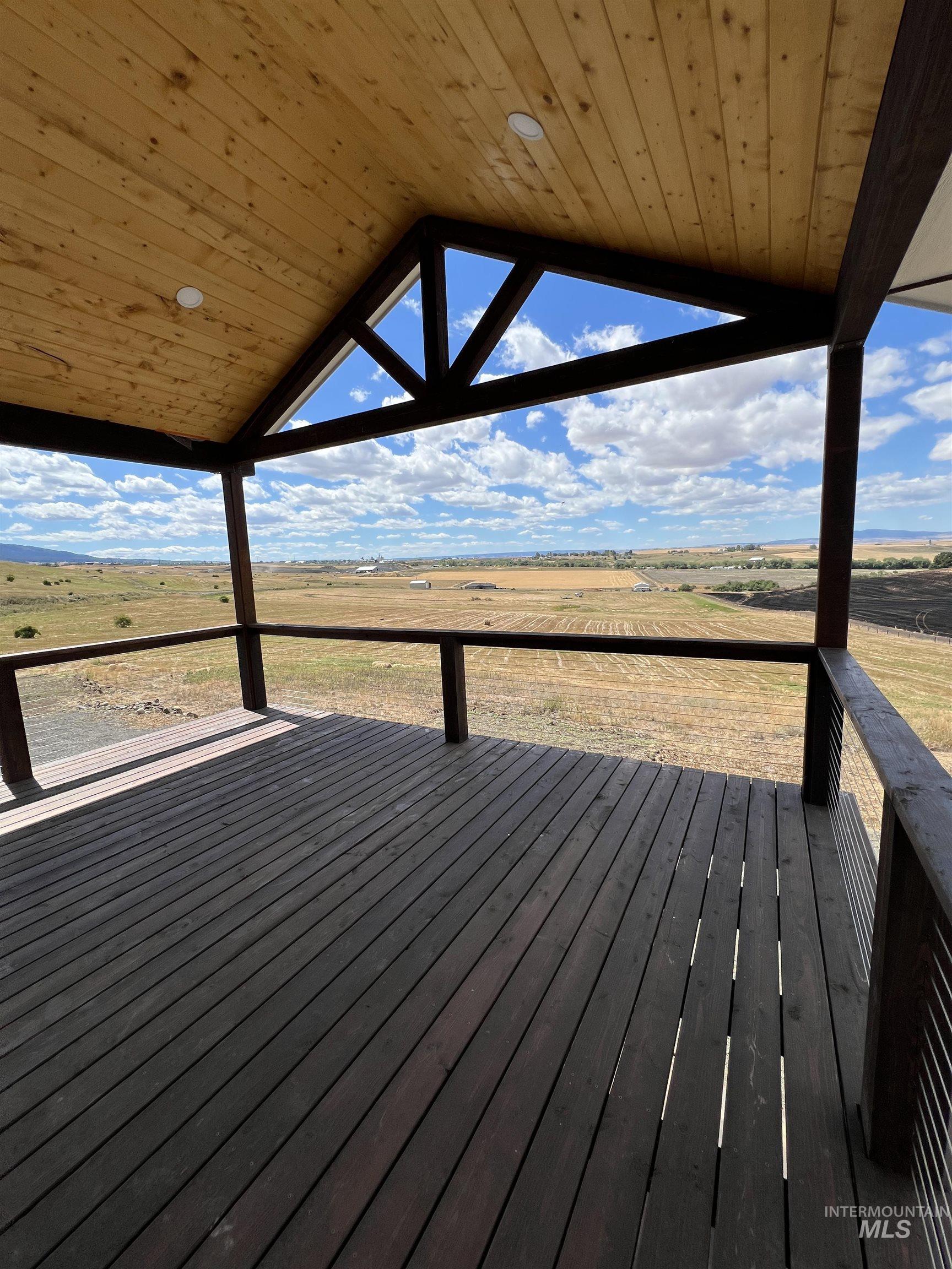Wooden terrace with a rural view