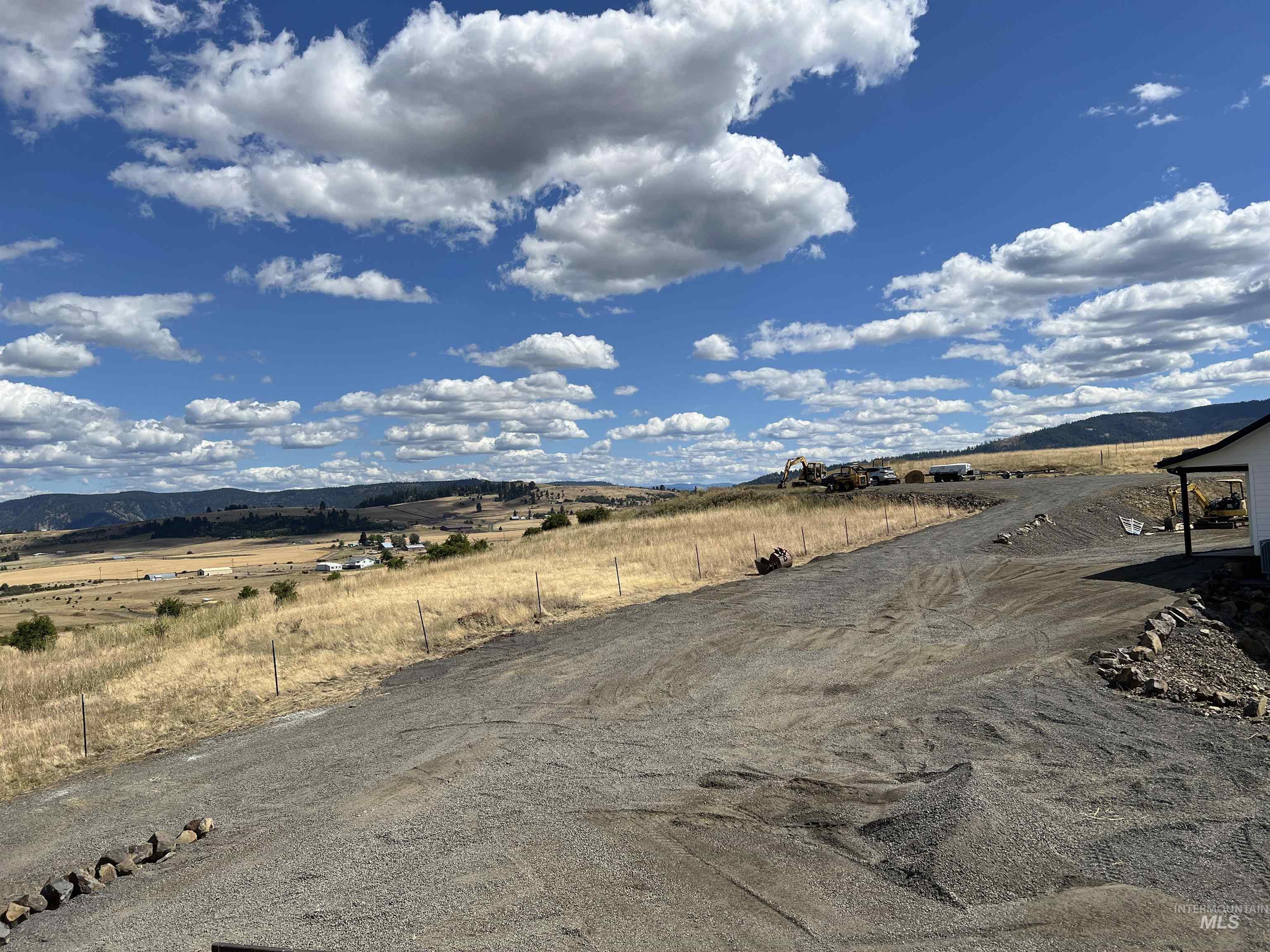 View of street with a mountain view and a view of countryside