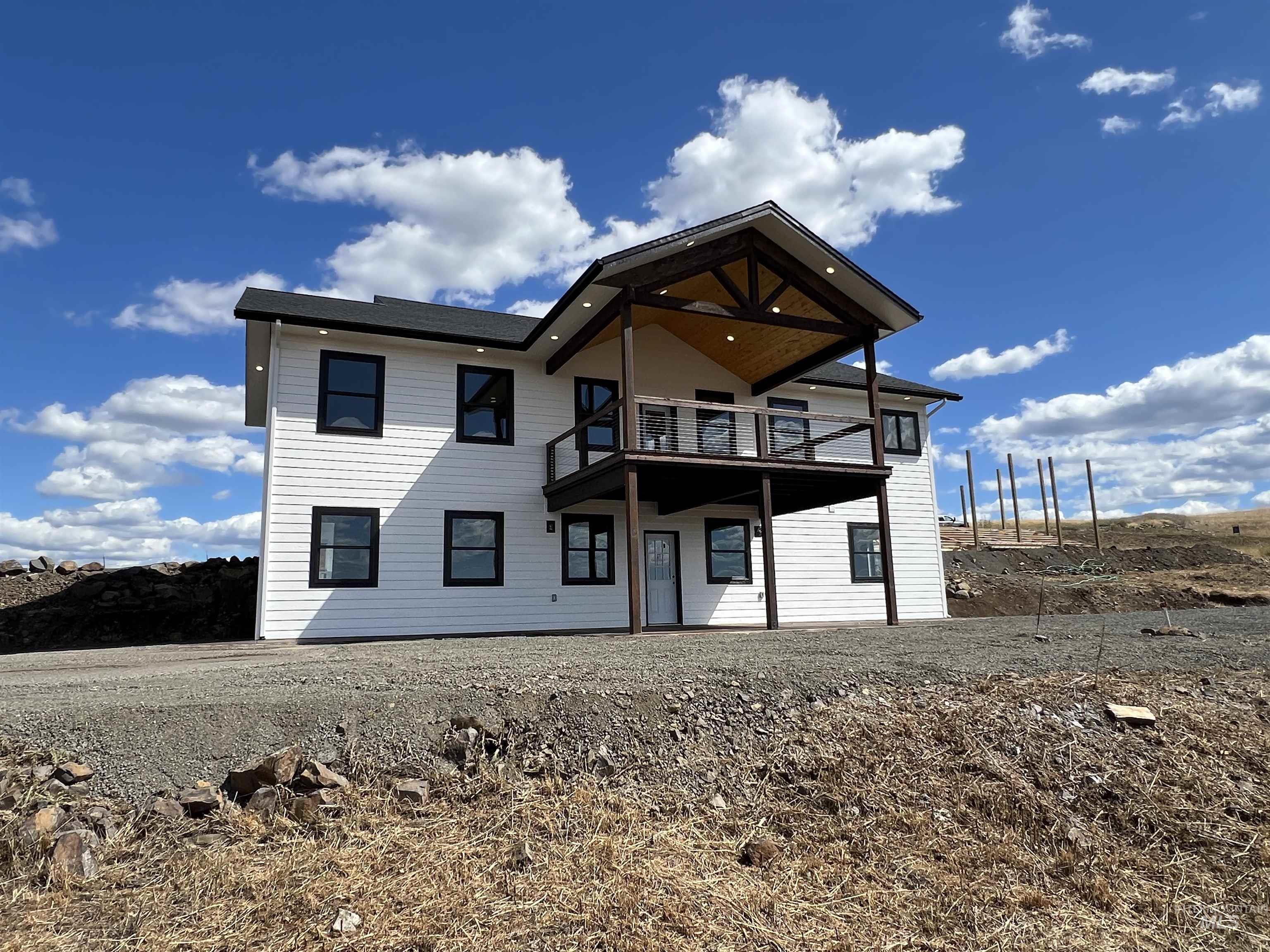 Back of property featuring a patio