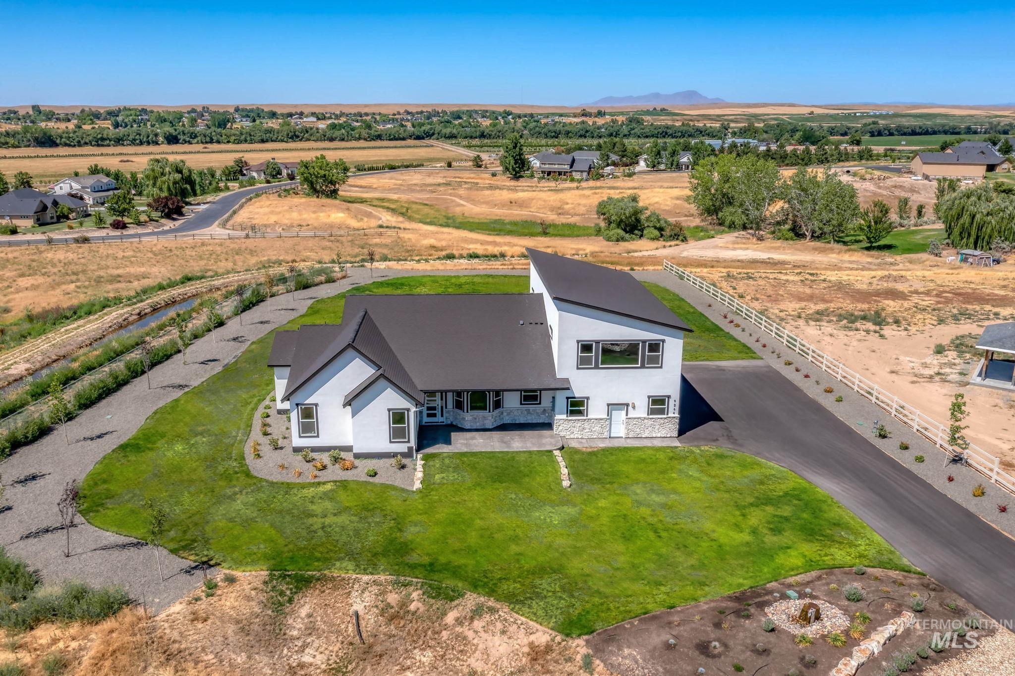Aerial view of property and surrounding area