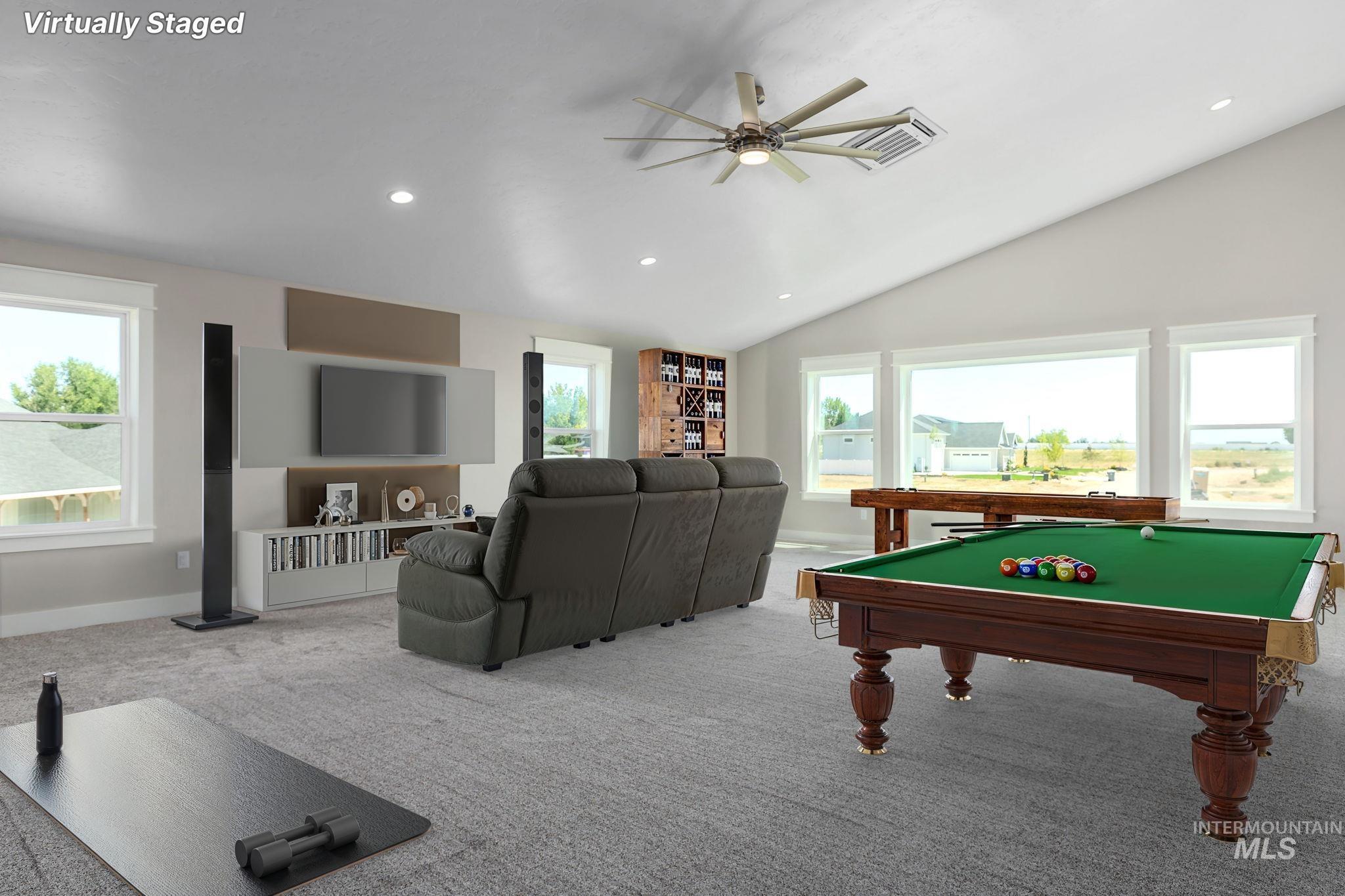 Recreation room featuring a ceiling fan, vaulted ceiling, billiards, recessed lighting, and carpet flooring