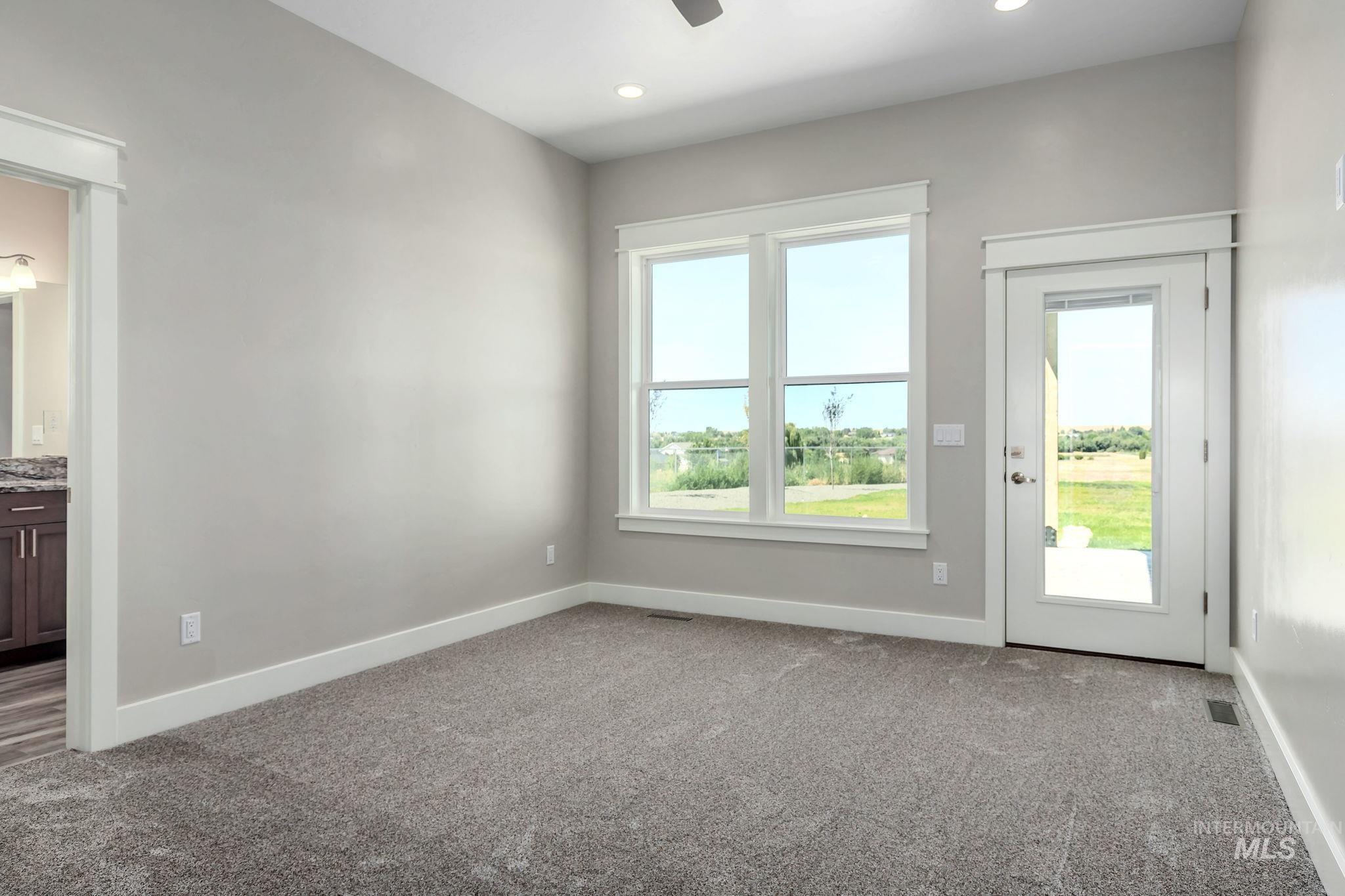 Ensuite guest bedroom featuring carpet, a ceiling fan, and recessed lighting