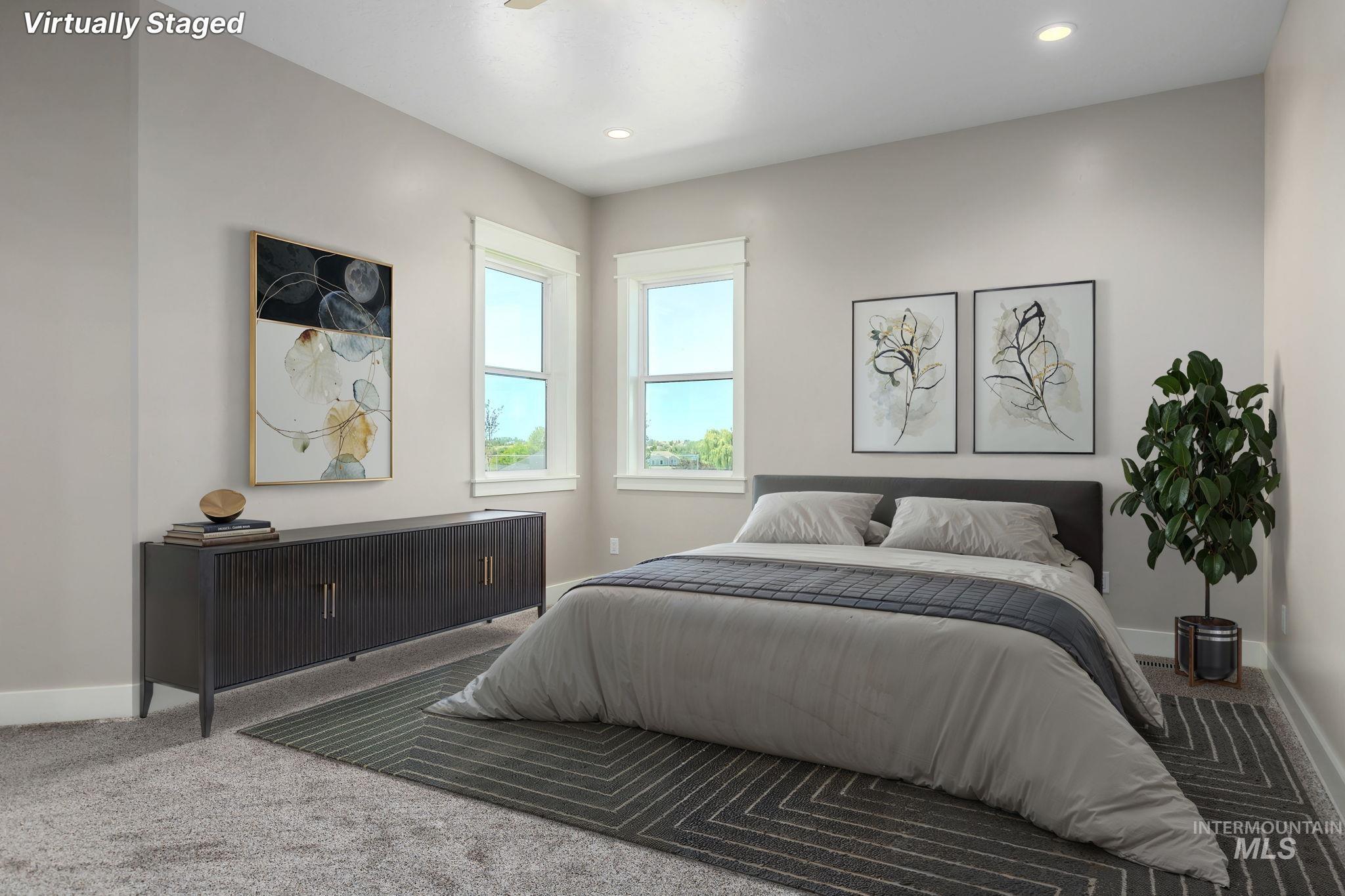 Bedroom with recessed lighting and carpet