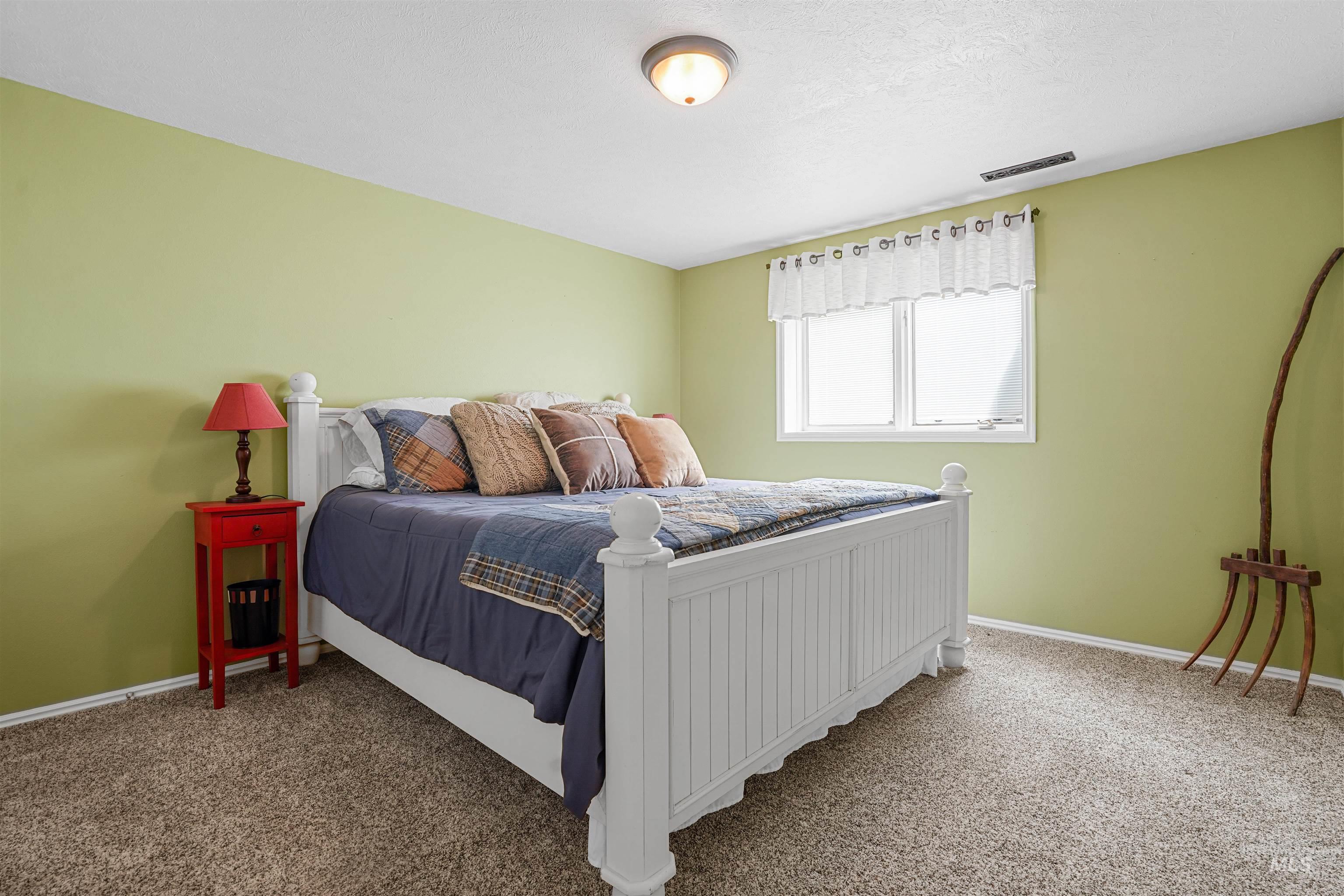 Bedroom with carpet