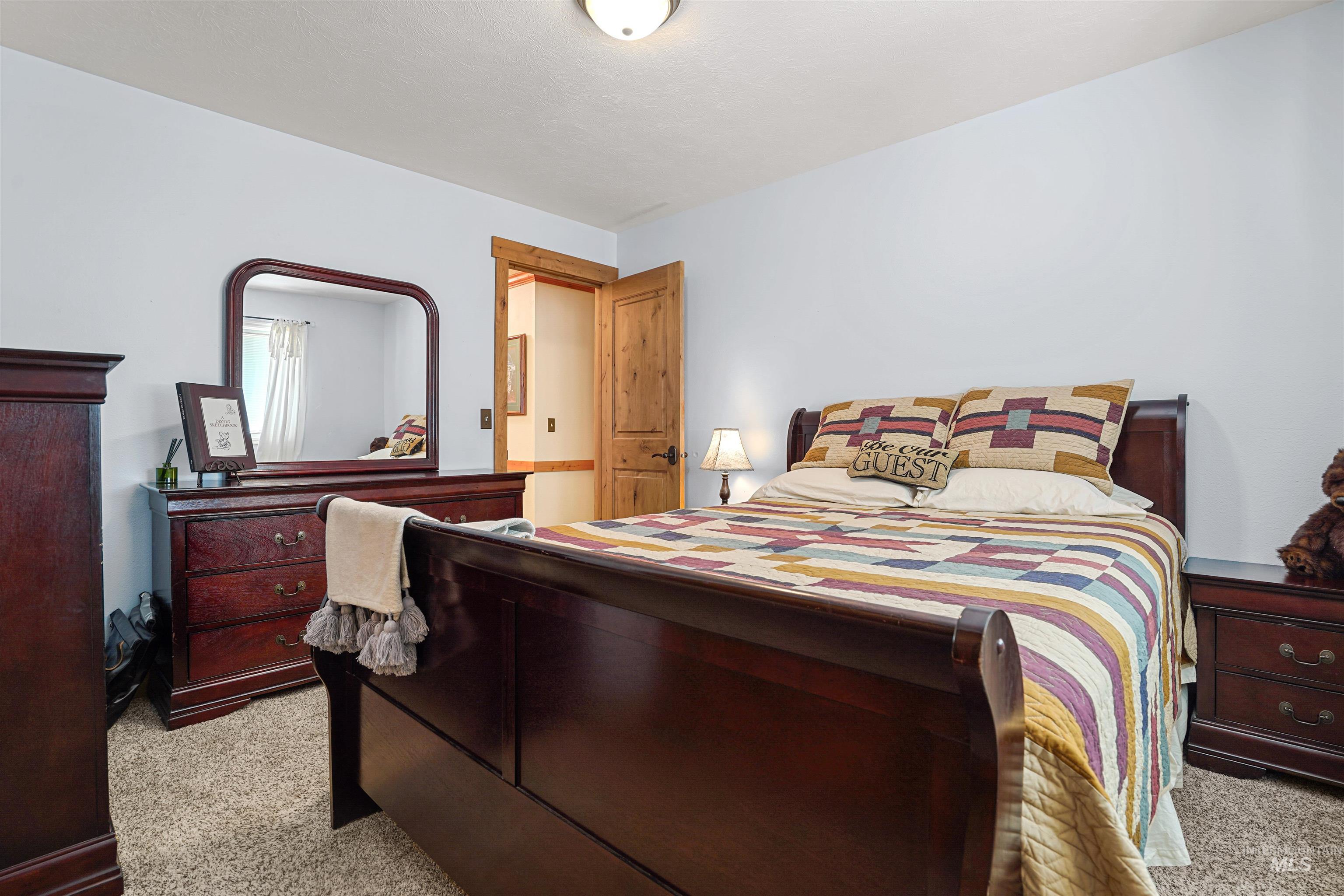 Bedroom featuring carpet