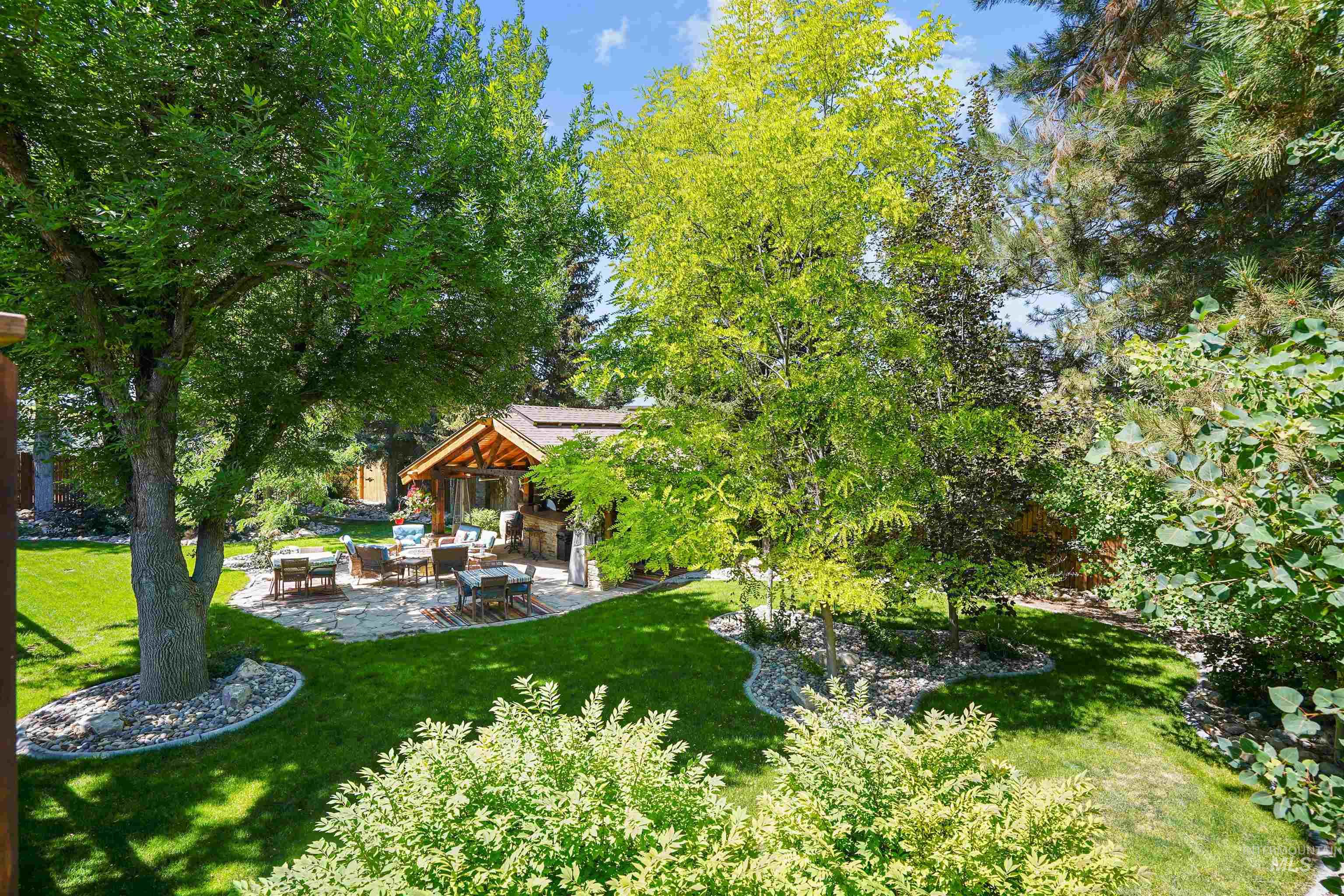 View of green lawn featuring outdoor lounge area and a patio area