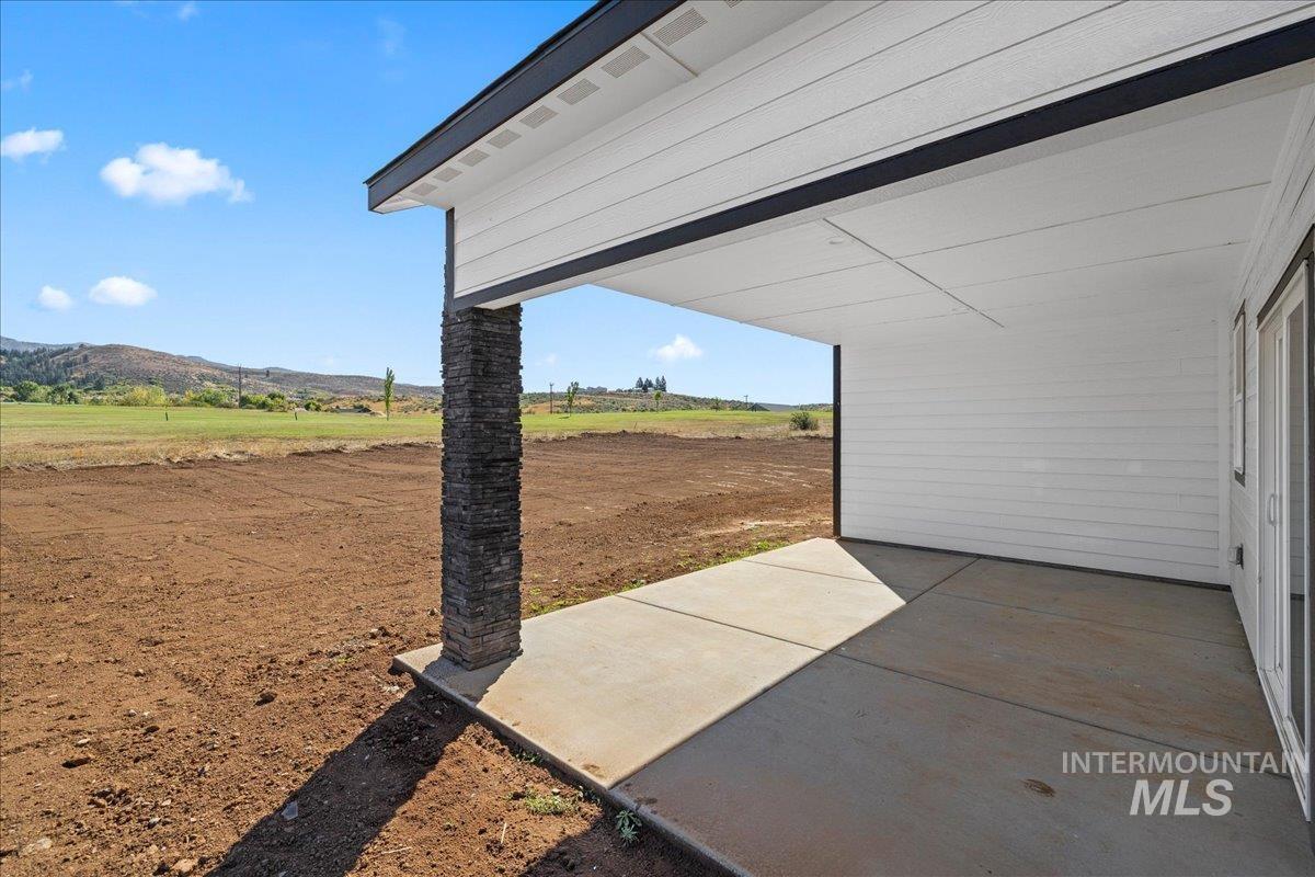View of patio / terrace featuring a mountain view