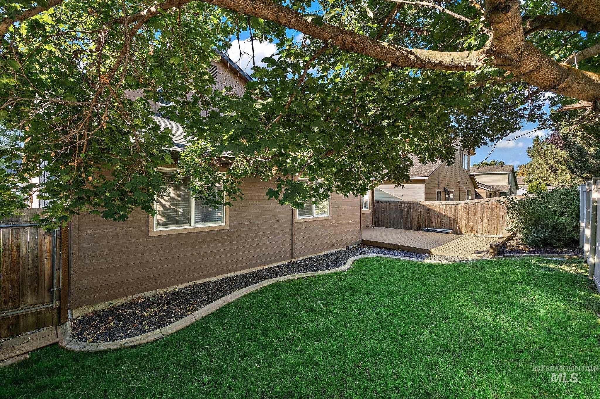 View of yard with a deck