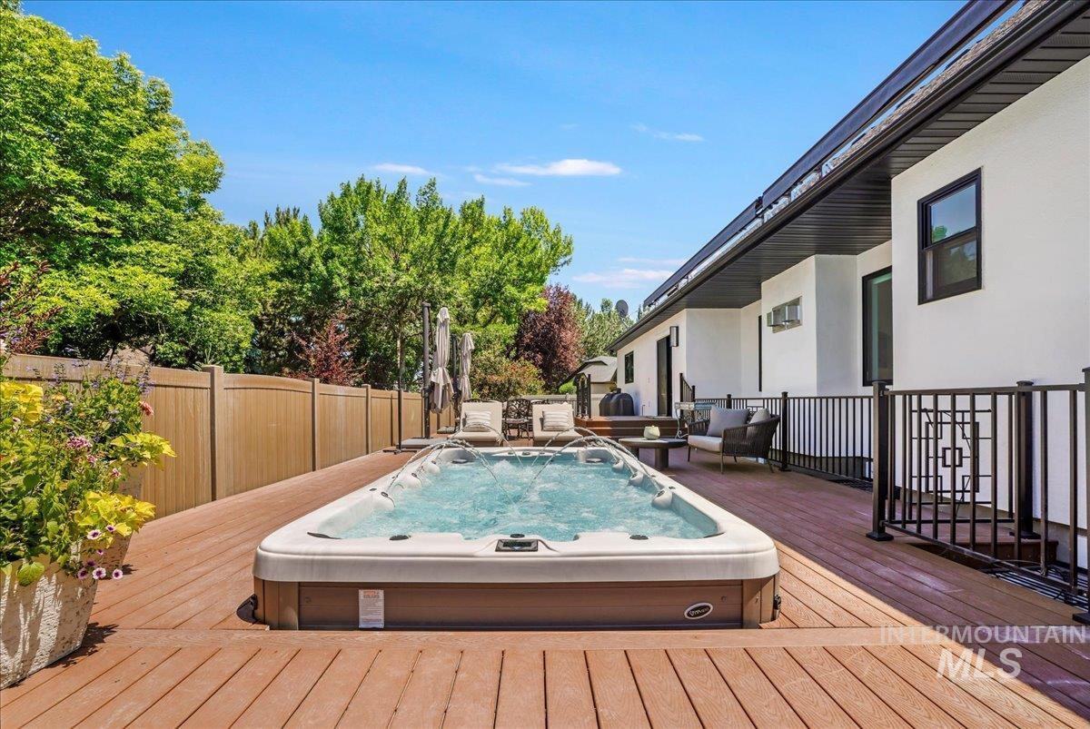 Wooden terrace with an outdoor hangout area