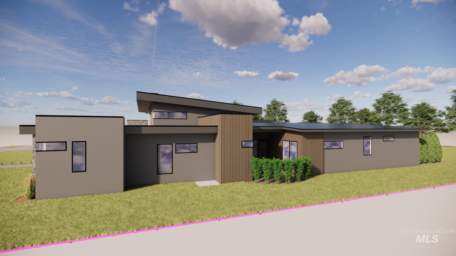 Back of house with a lawn