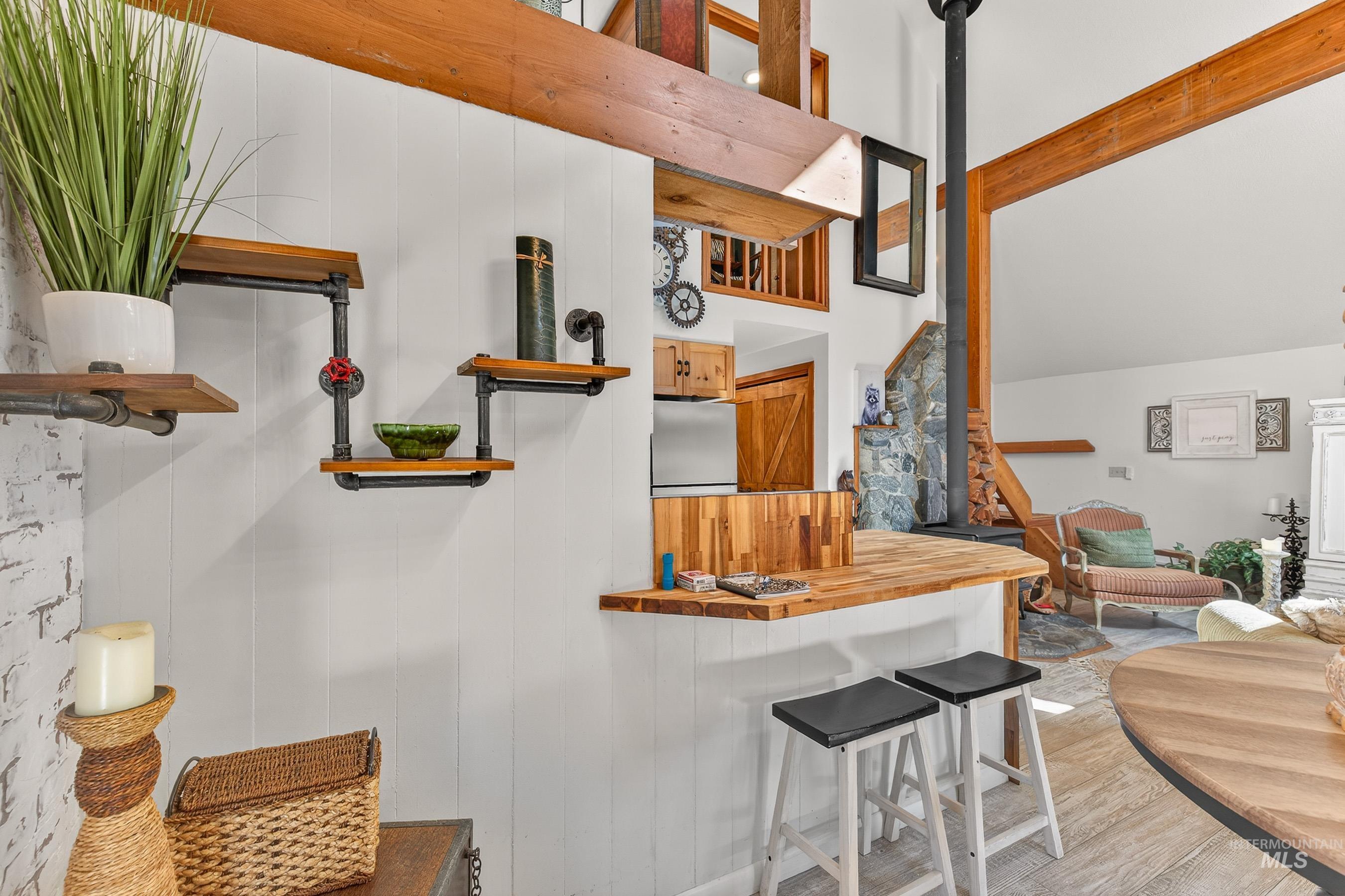 Natural wood bar with butcher block countertop